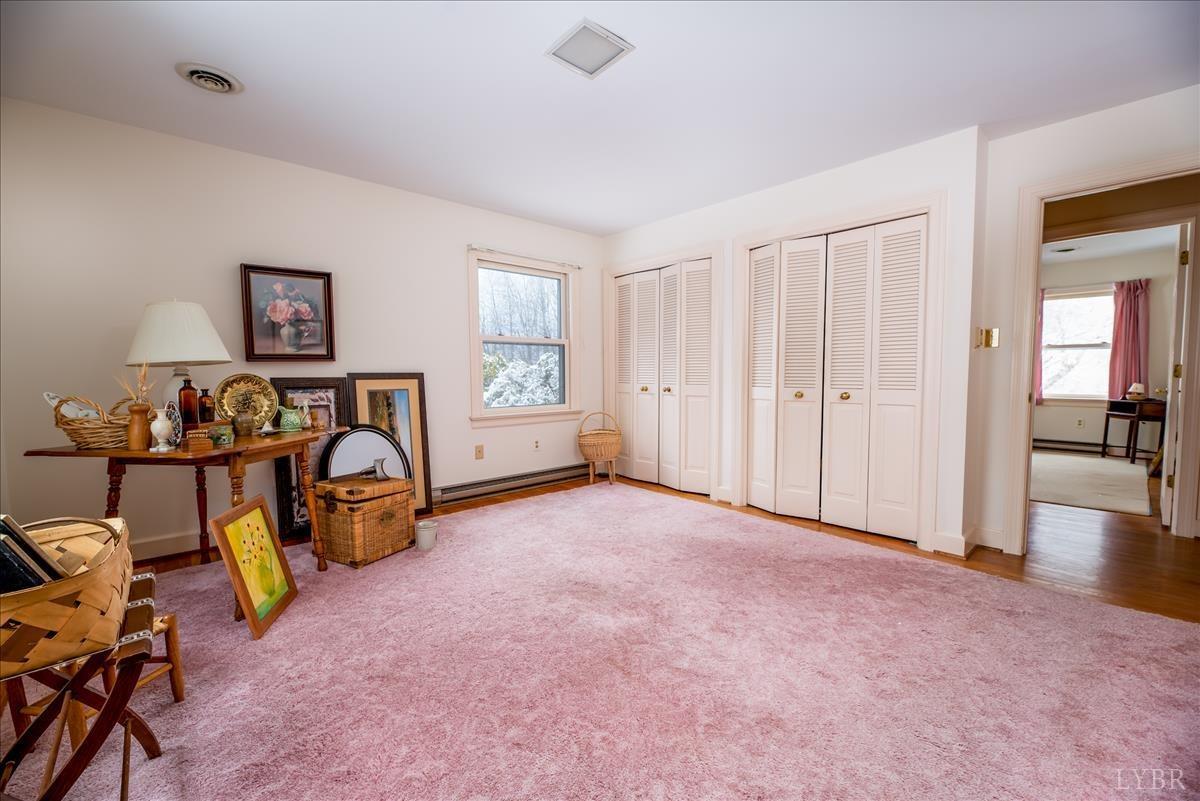 1086 Redfields Road Appomattox, VA 24522 - Photo 11 of 33 a view of a room with gym equipment