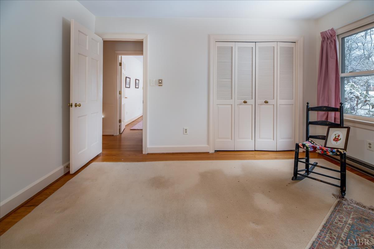 1086 Redfields Road Appomattox, VA 24522 - Photo 13 of 33 an empty room with windows and closet