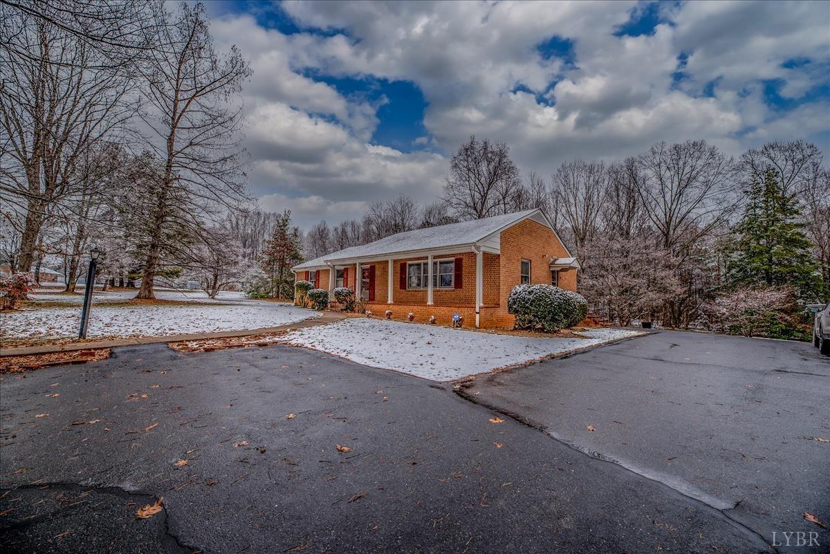 1086 Redfields Road Appomattox, VA 24522 - Photo 2 of 33 a aerial view of a house with a yard