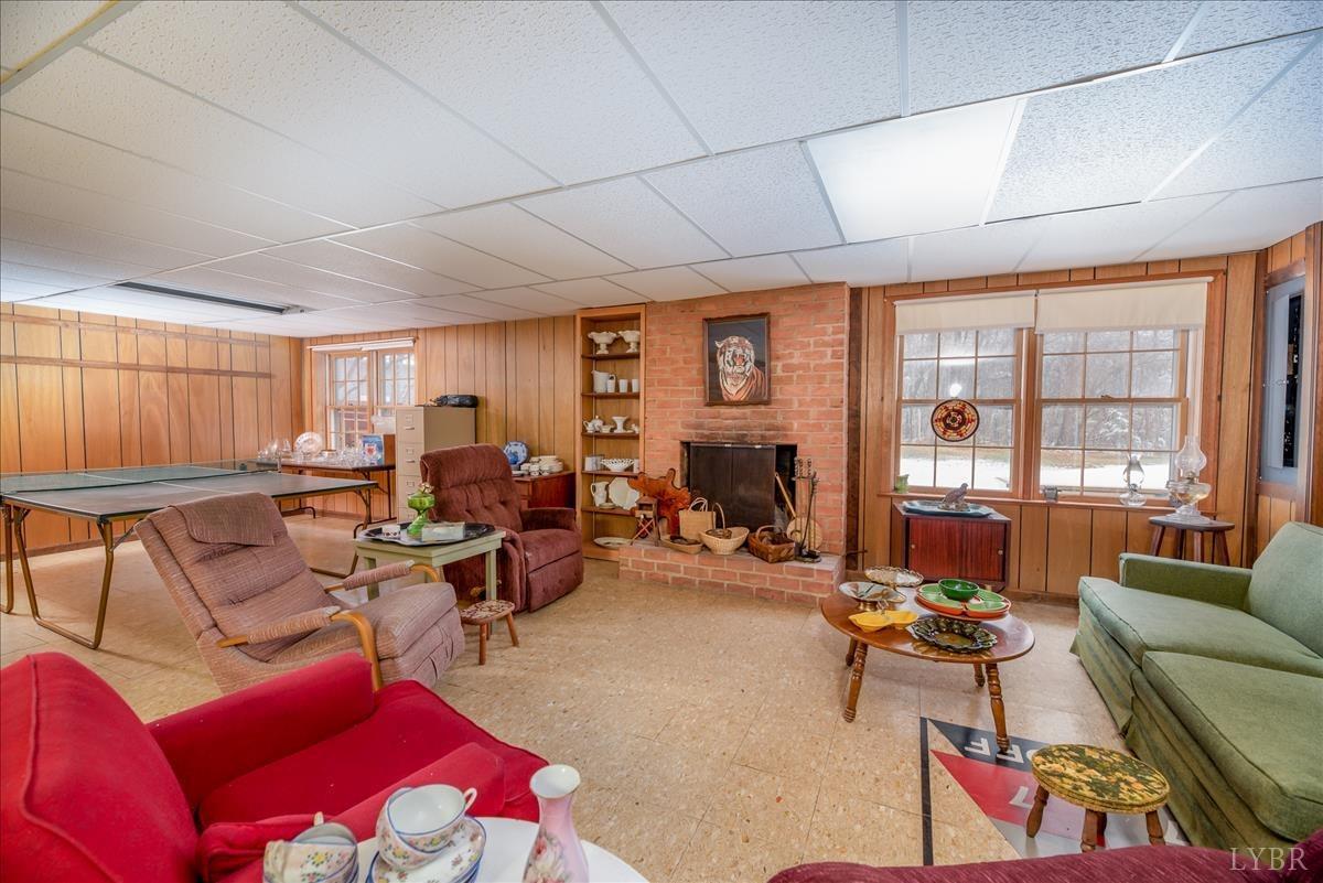 1086 Redfields Road Appomattox, VA 24522 - Photo 22 of 33 a living room with furniture and a large window