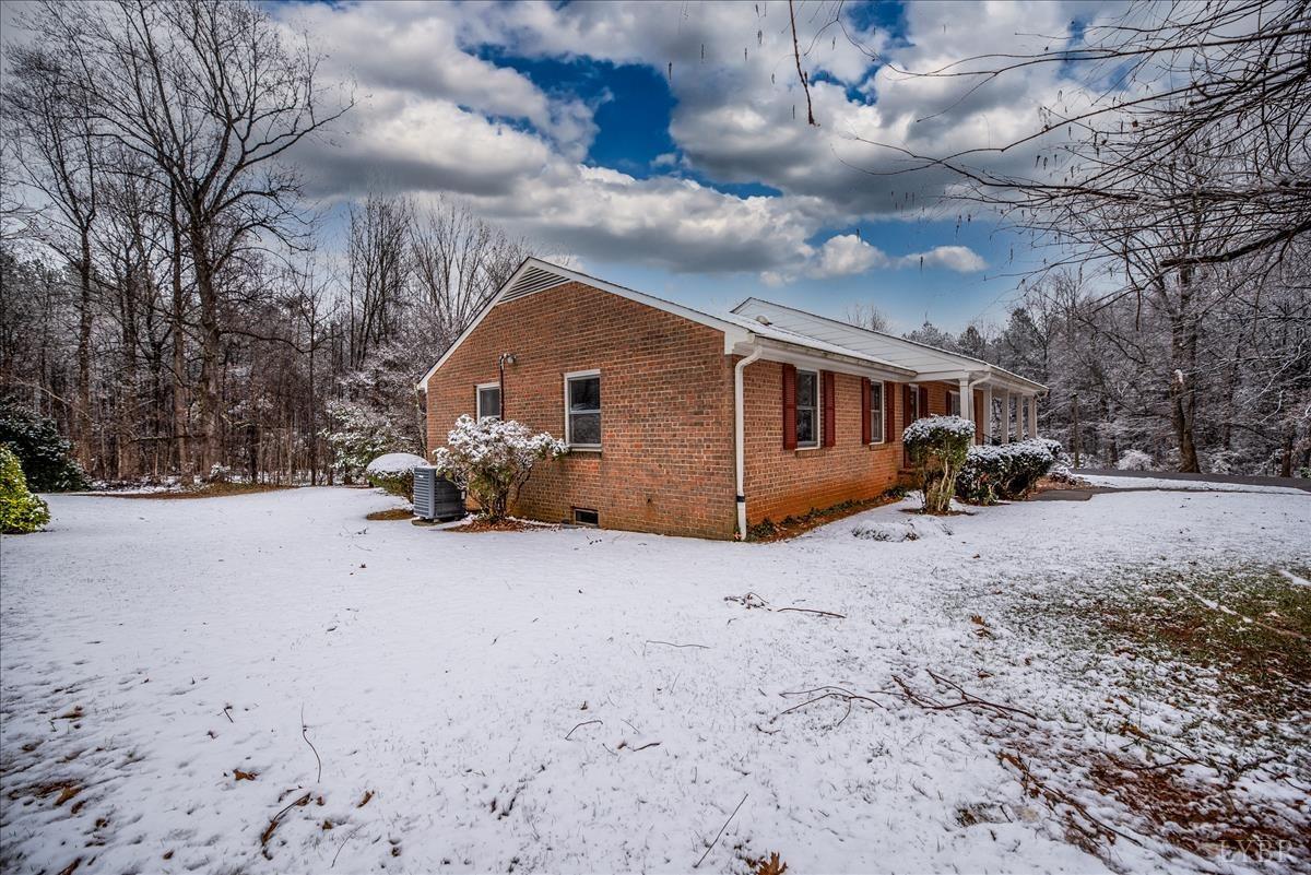 1086 Redfields Road Appomattox, VA 24522 - Photo 29 of 33 a view of a house with a yard