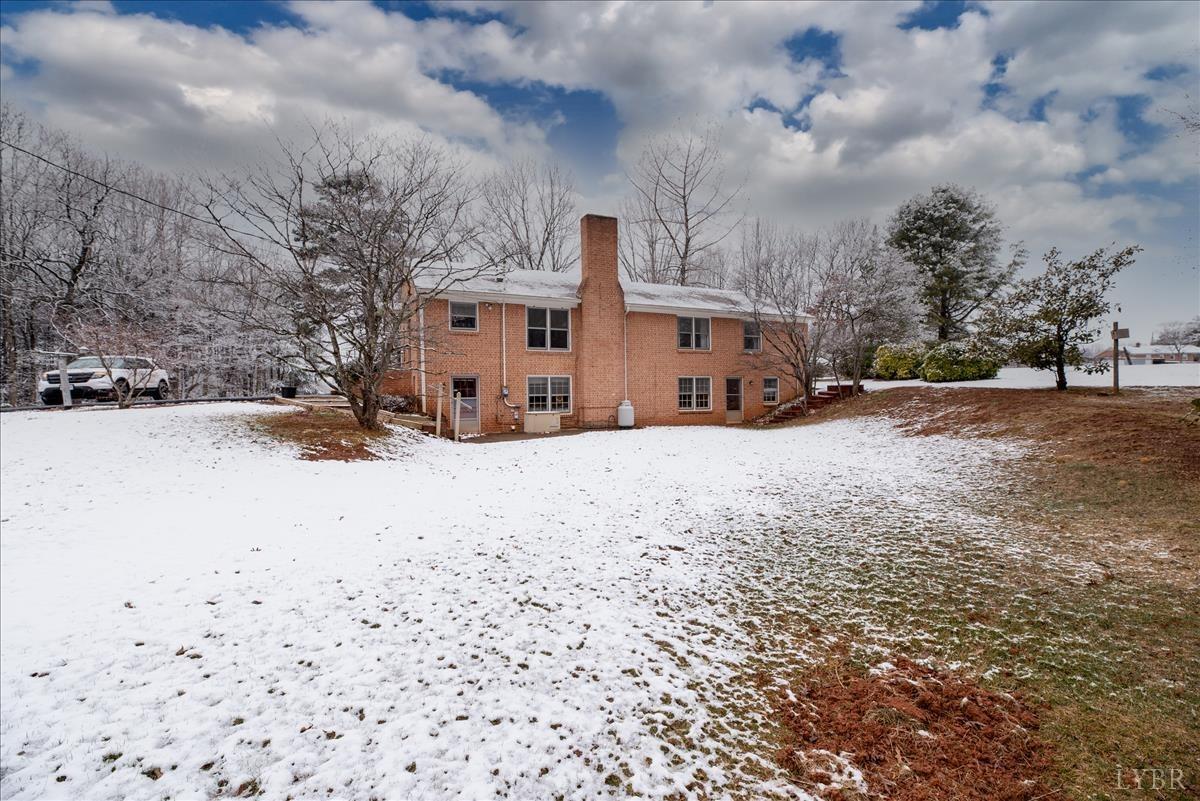 1086 Redfields Road Appomattox, VA 24522 - Photo 32 of 33 a view of a house with a snow in front of yard
