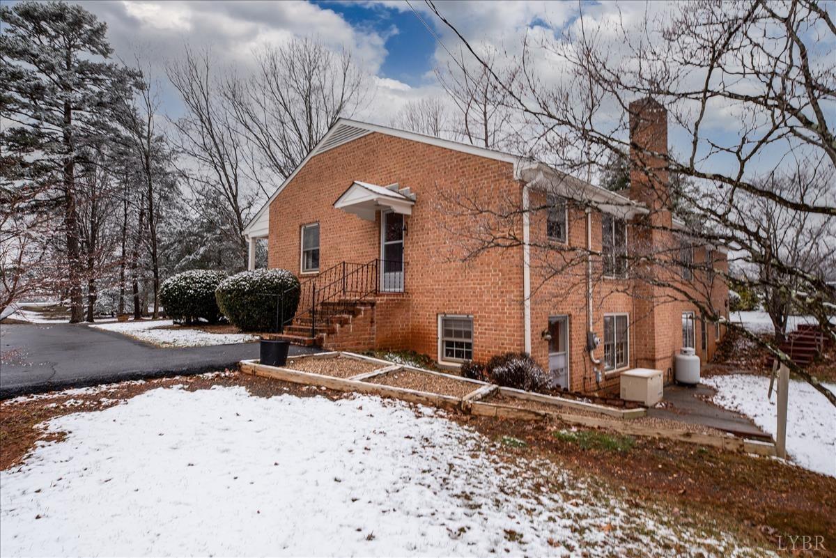 1086 Redfields Road Appomattox, VA 24522 - Photo 33 of 33 a front view of a house with a yard