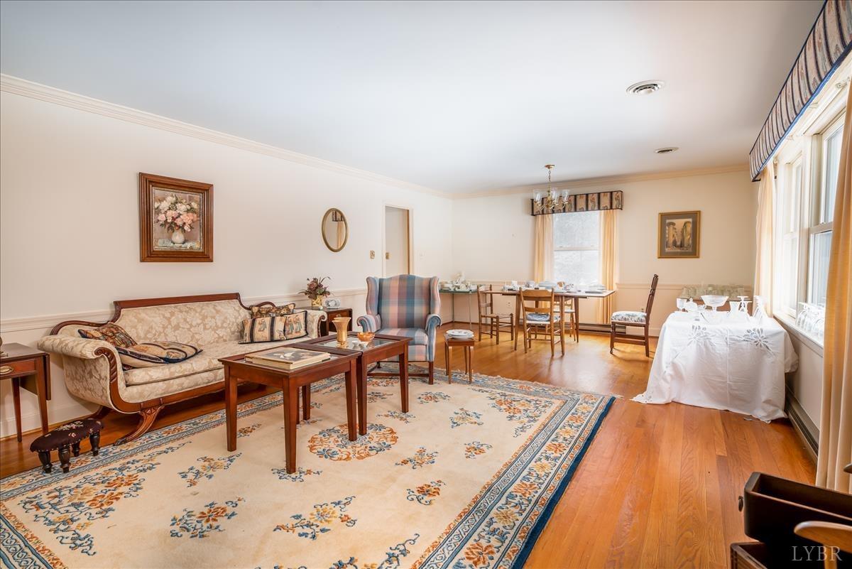 1086 Redfields Road Appomattox, VA 24522 - Photo 5 of 33 a living room with furniture and wooden floor
