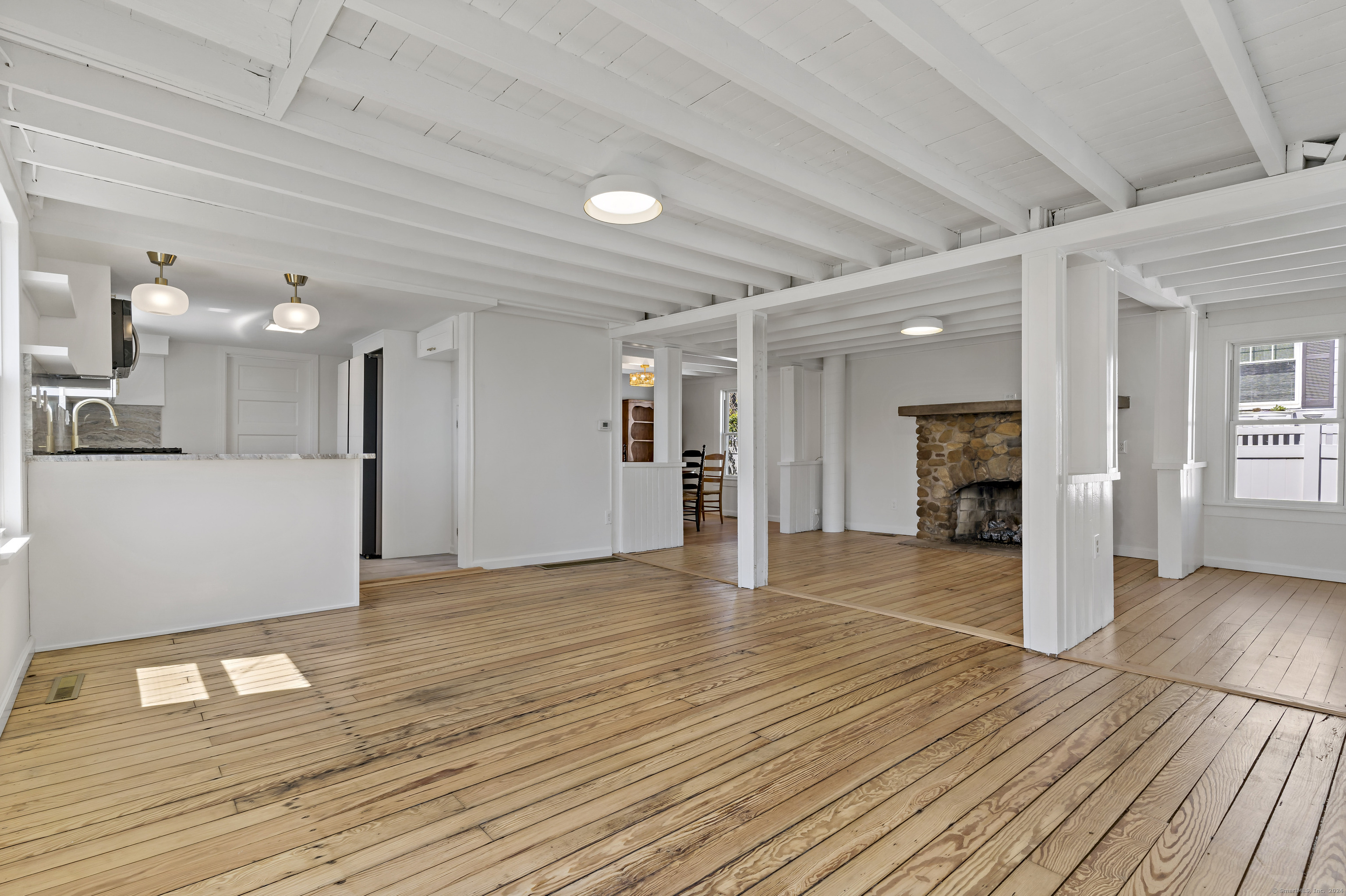 14 2nd Avenue Branford, CT 06405 - Photo 11 of 29 a view of a livingroom with wooden floor