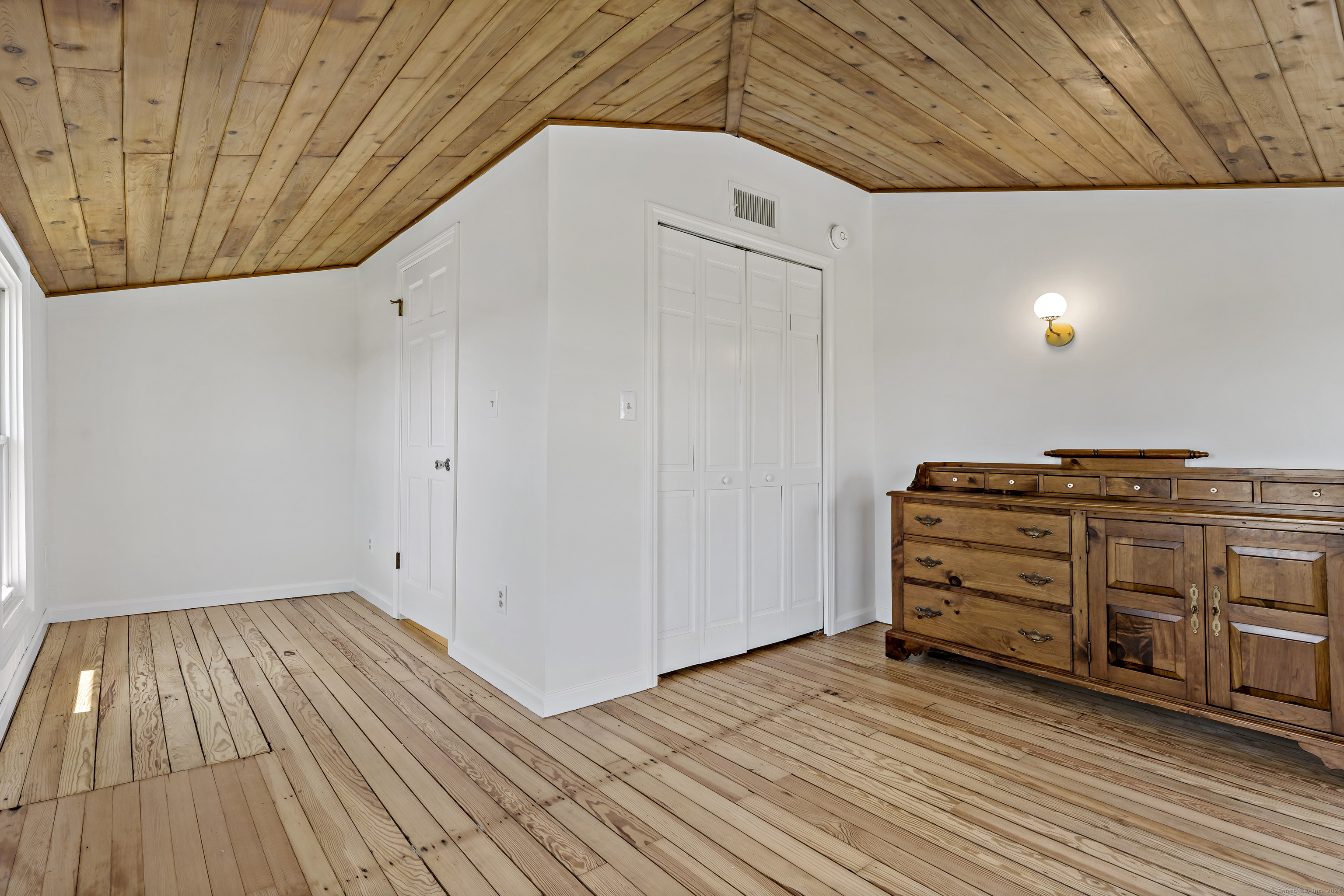 14 2nd Avenue Branford, CT 06405 - Photo 18 of 29 a view of a room with wooden floor