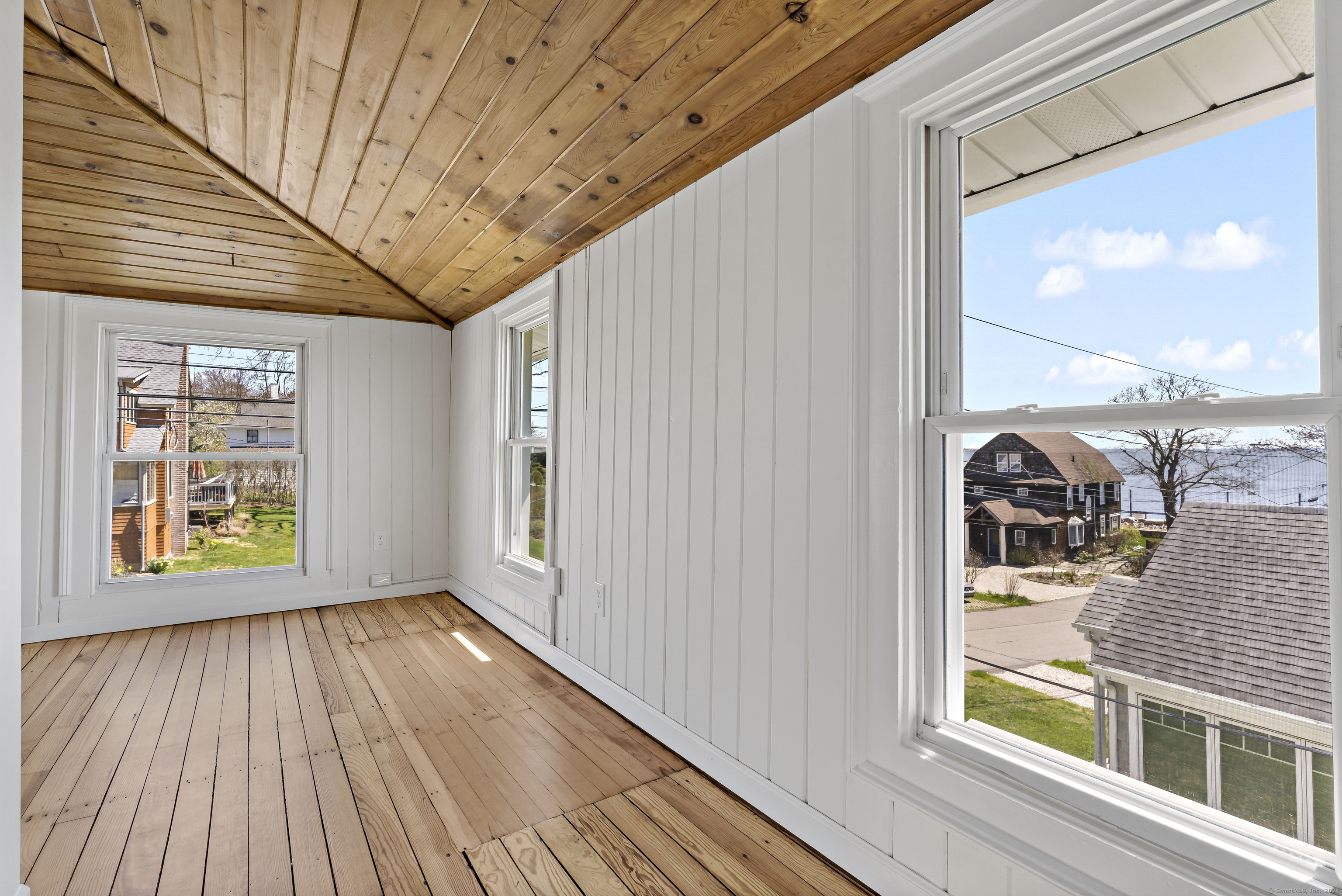 14 2nd Avenue Branford, CT 06405 - Photo 20 of 29 a view of a room with wooden floor and a window