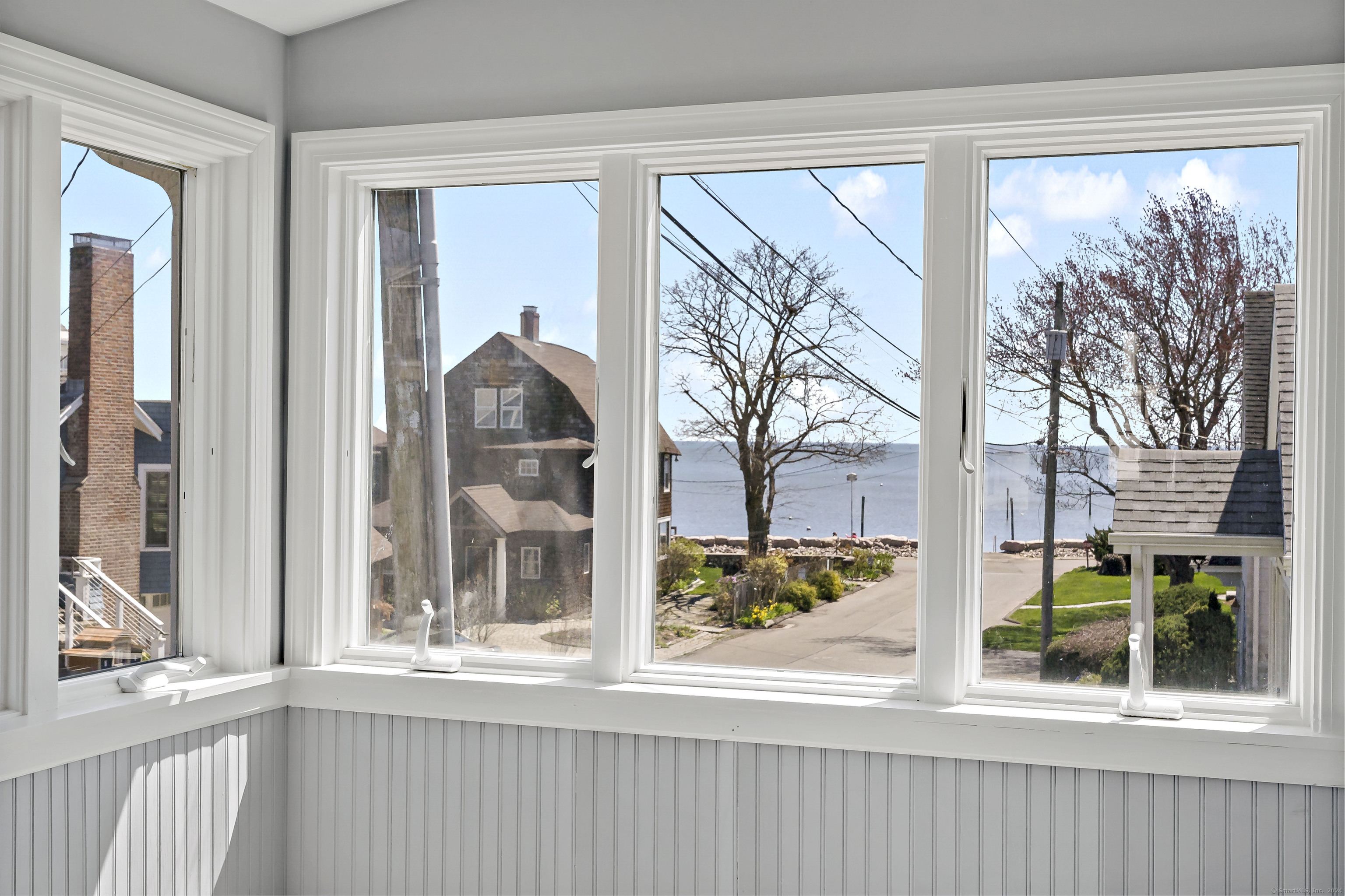 14 2nd Avenue Branford, CT 06405 - Photo 24 of 29 a front view of a house with large windows
