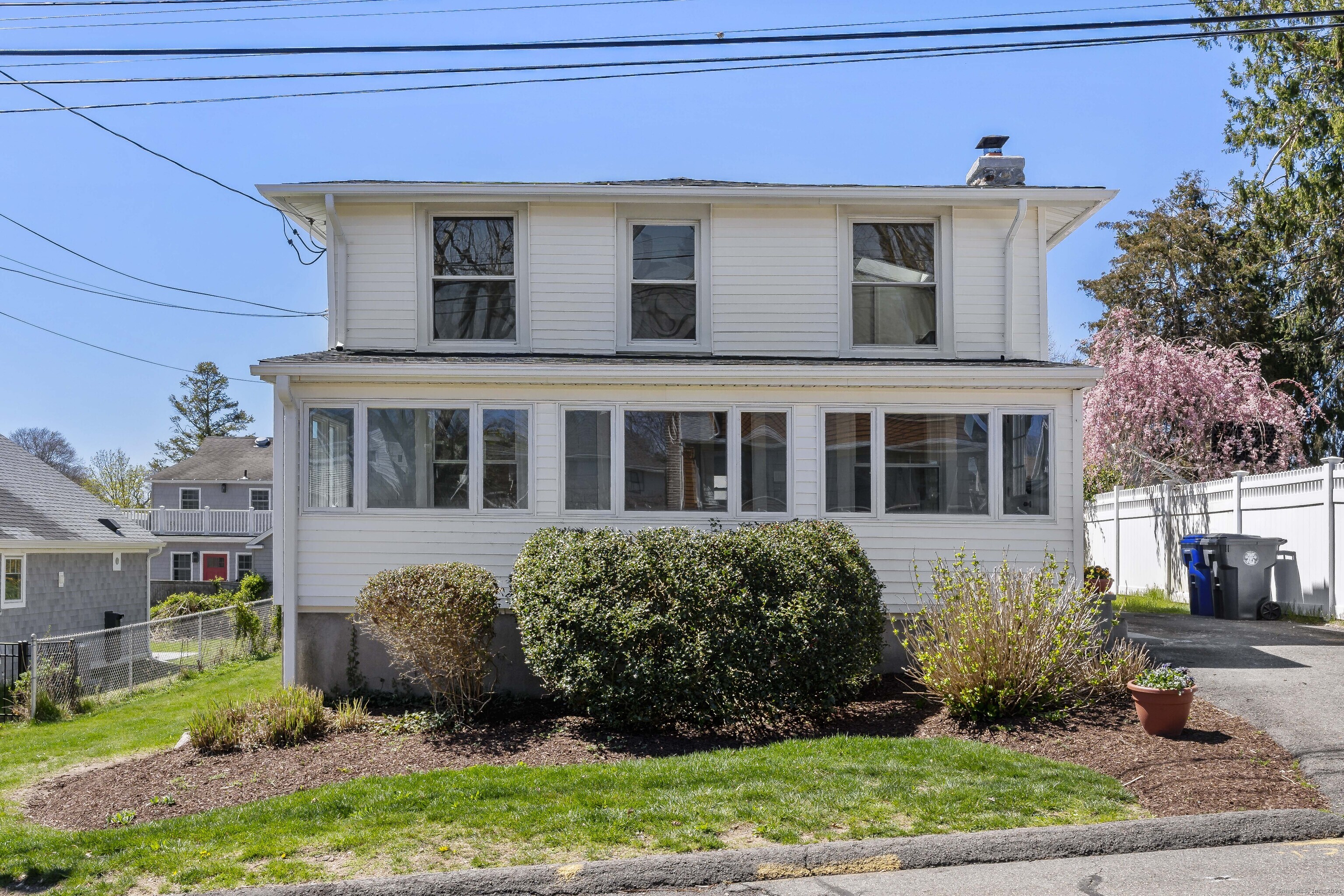 14 2nd Avenue Branford, CT 06405 - Photo 26 of 29 a front view of a house with a yard