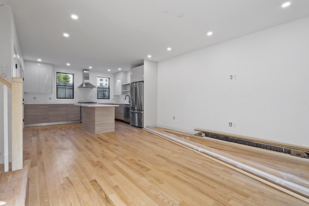 3 Pulaski Avenue Boston, MA 02127 - Photo 7 of 19 a view of kitchen with sink and refrigerator