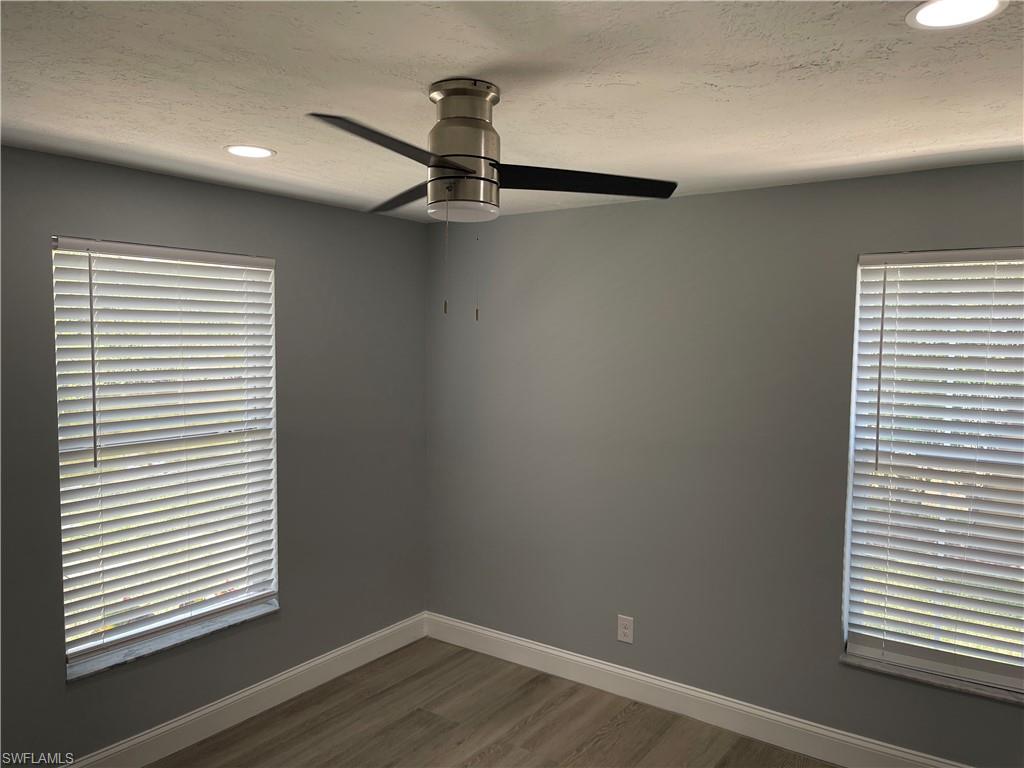 528 14th Street North Naples, FL 34102 - Photo 14 of 19 an empty room with a window