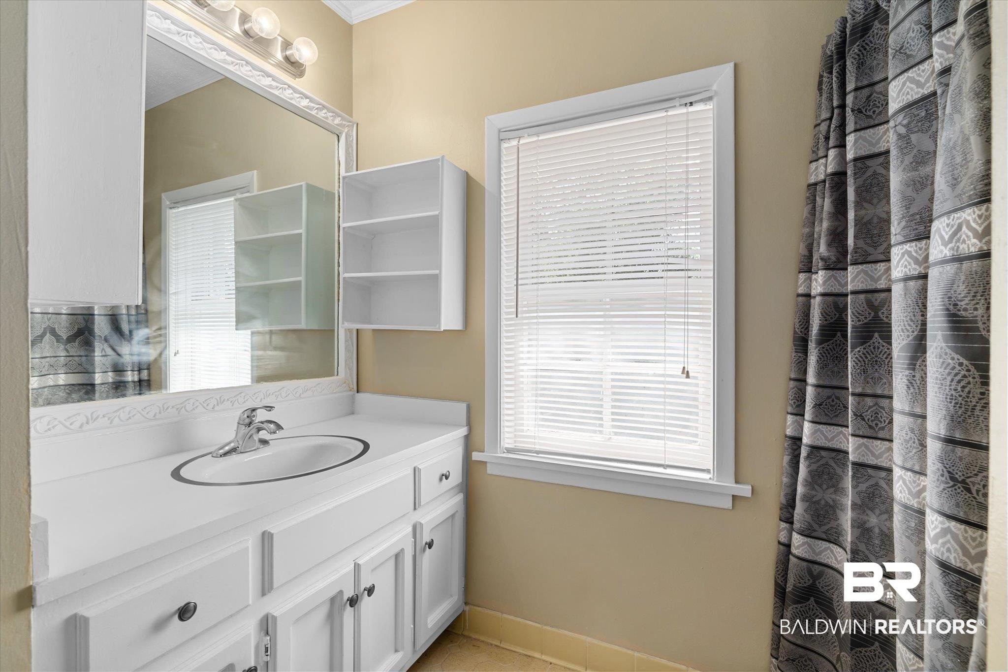 1953 Dauphin Street Mobile, AL 36606 - Photo 41 of 56 Bathroom featuring vanity