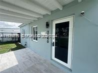 2240 Rutland Street Opa-Locka, FL 33054 - Photo 7 of 19 a view of a living room