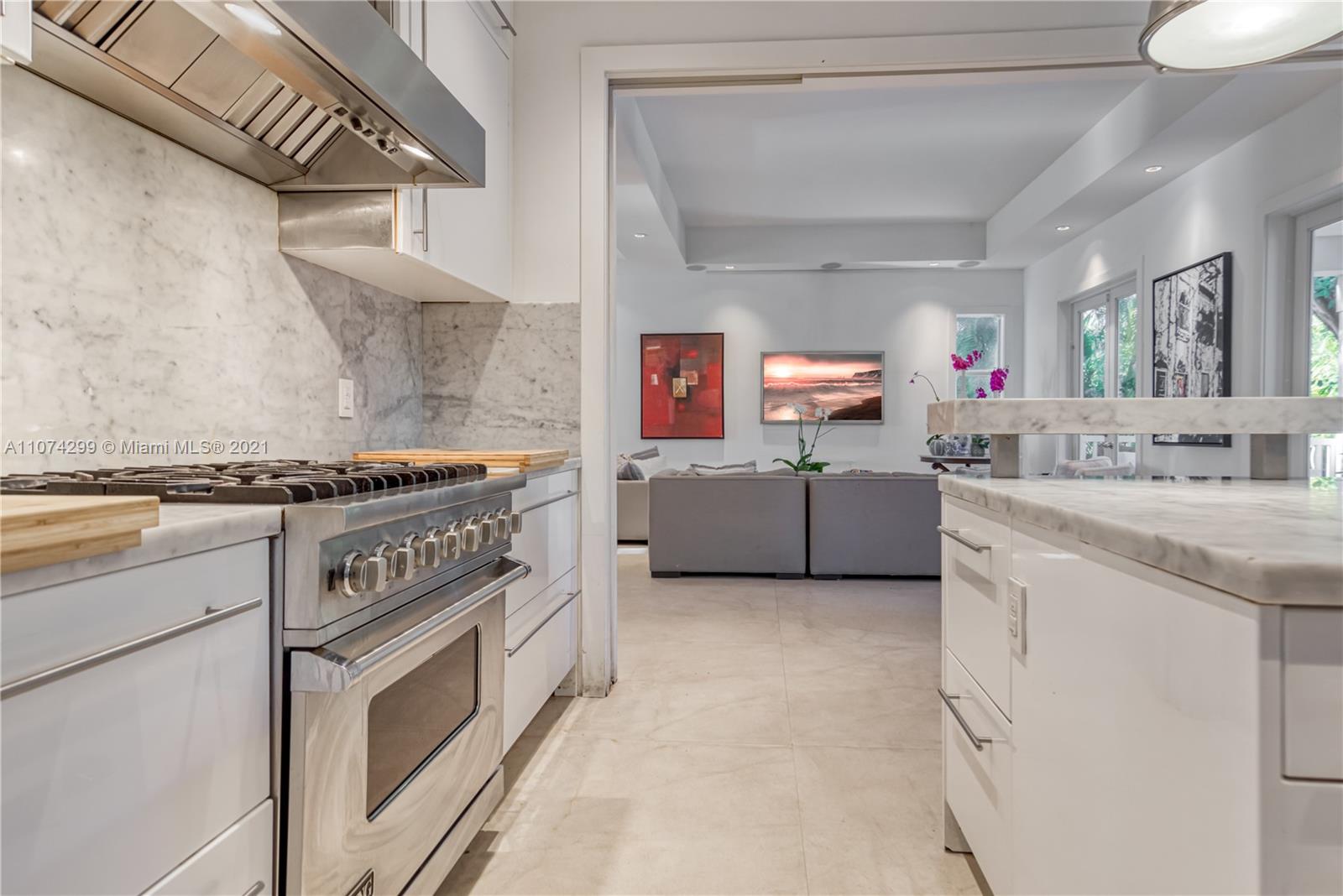 325 Hampton Lane Key Biscayne, FL 33149 - Photo 11 of 37 a kitchen with a stove and a sink