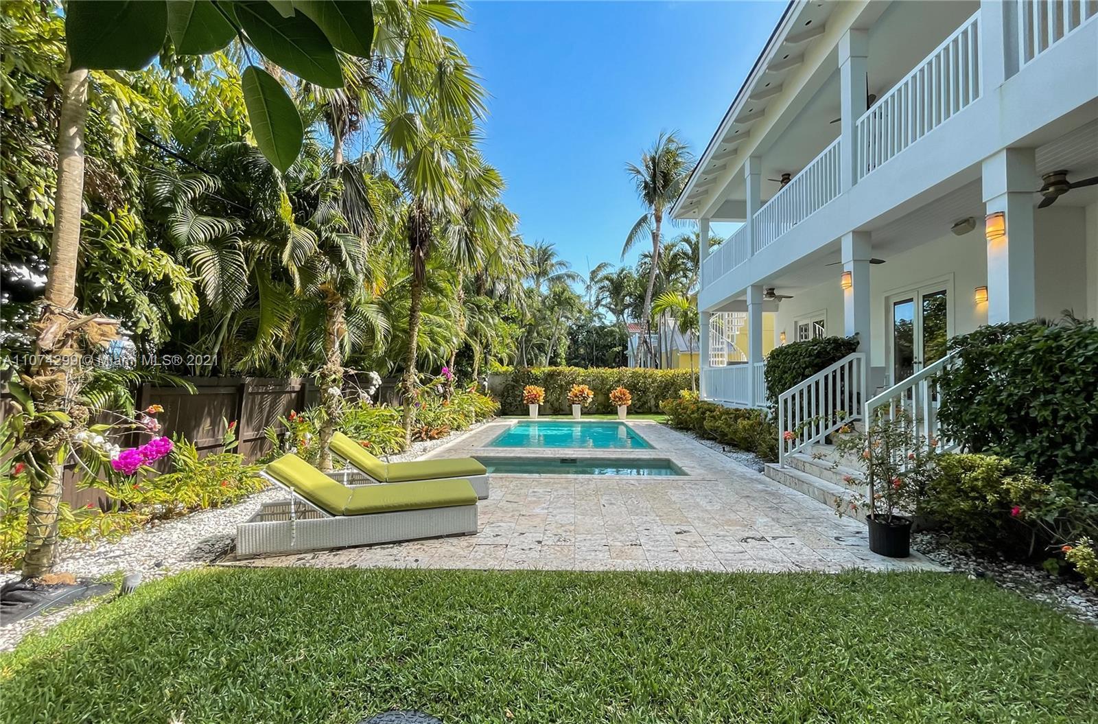325 Hampton Lane Key Biscayne, FL 33149 - Photo 25 of 37 a view of yard with patio
