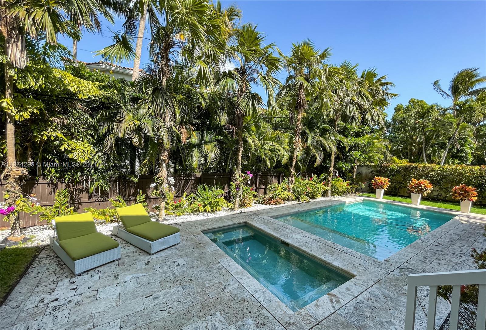325 Hampton Lane Key Biscayne, FL 33149 - Photo 28 of 37 swimming pool with outdoor seating