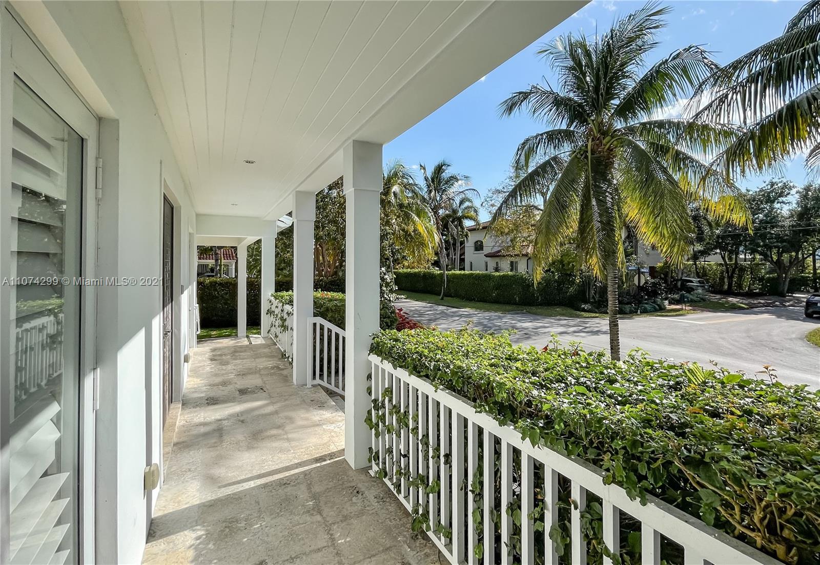 325 Hampton Lane Key Biscayne, FL 33149 - Photo 34 of 37 a view of potted plants in front of house