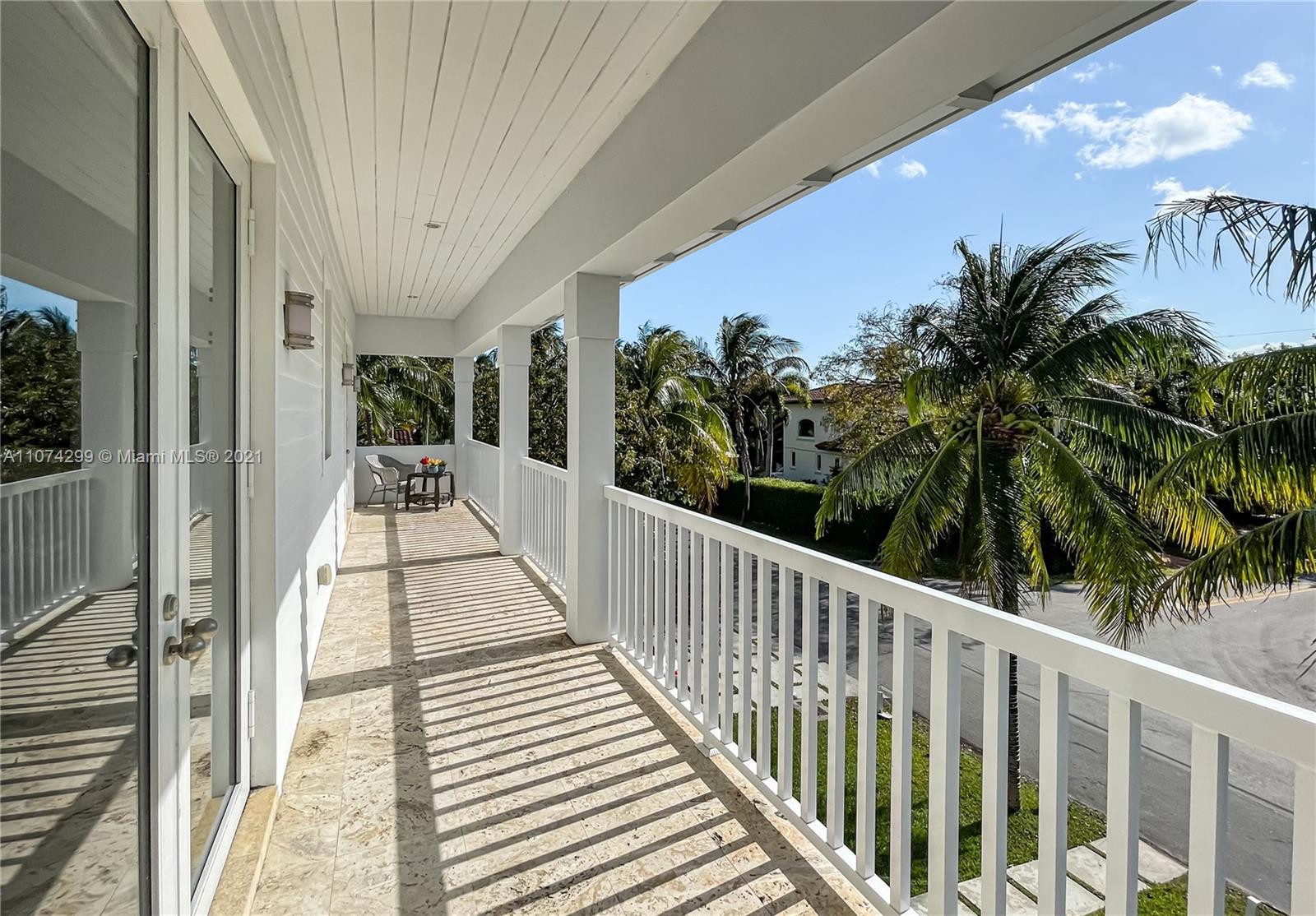325 Hampton Lane Key Biscayne, FL 33149 - Photo 35 of 37 a view of a balcony