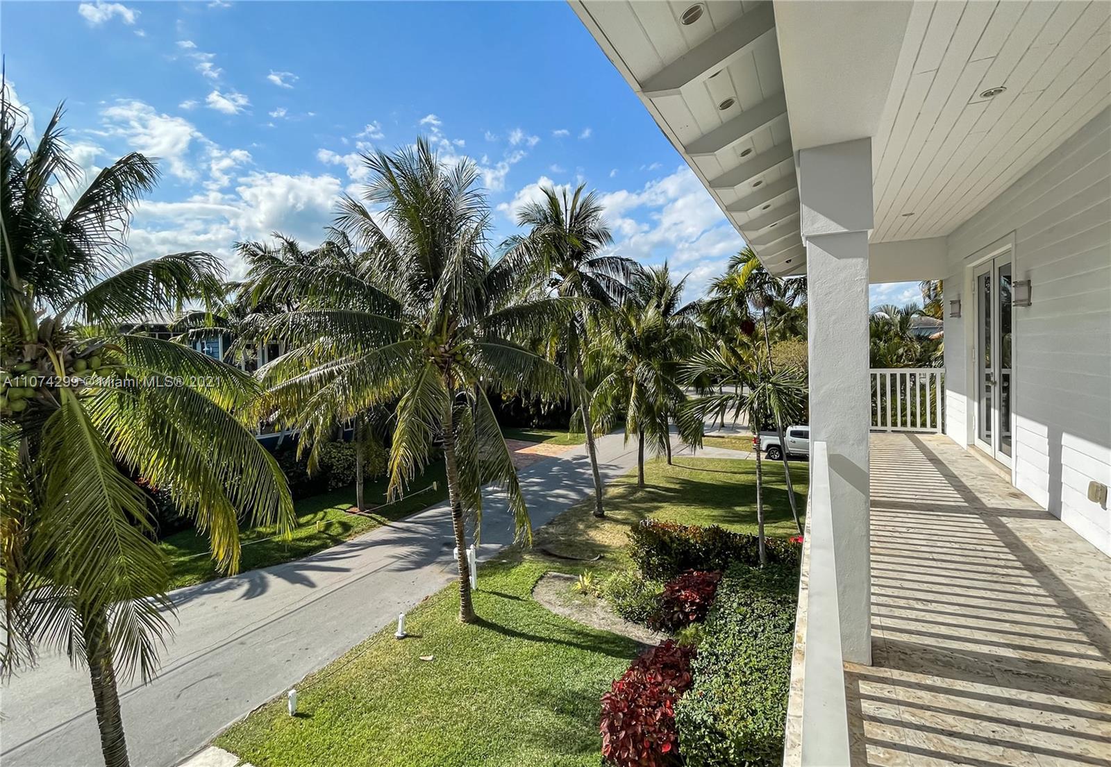 325 Hampton Lane Key Biscayne, FL 33149 - Photo 36 of 37 a view of a backyard