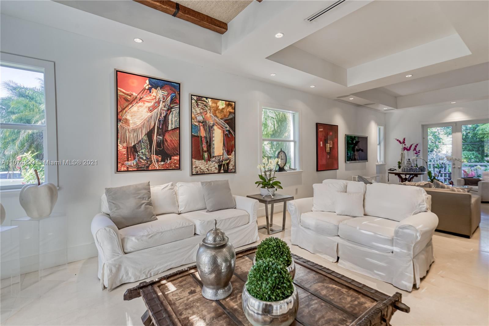 325 Hampton Lane Key Biscayne, FL 33149 - Photo 5 of 37 a living room with furniture and a large window