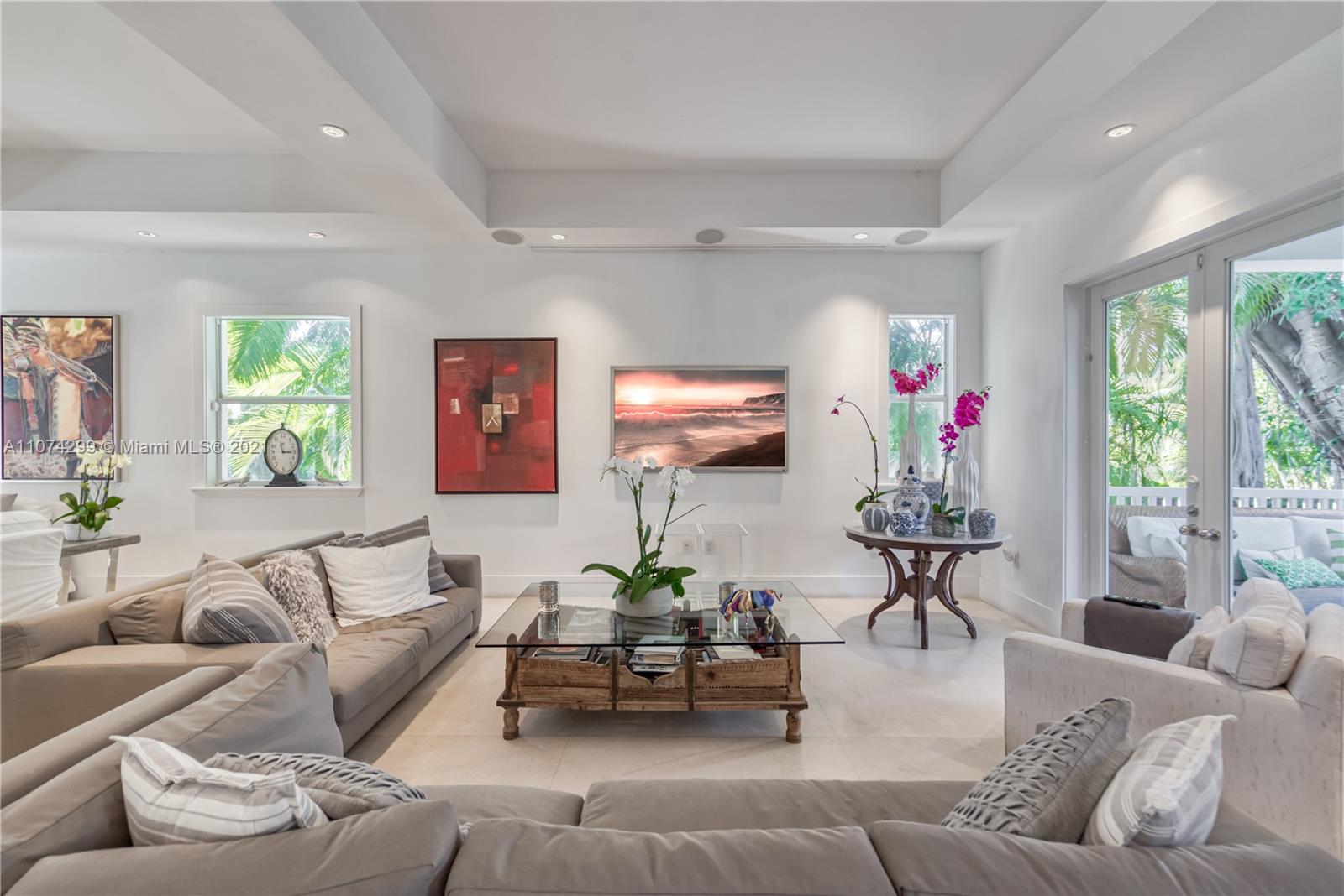 325 Hampton Lane Key Biscayne, FL 33149 - Photo 7 of 37 a living room with furniture and a large window