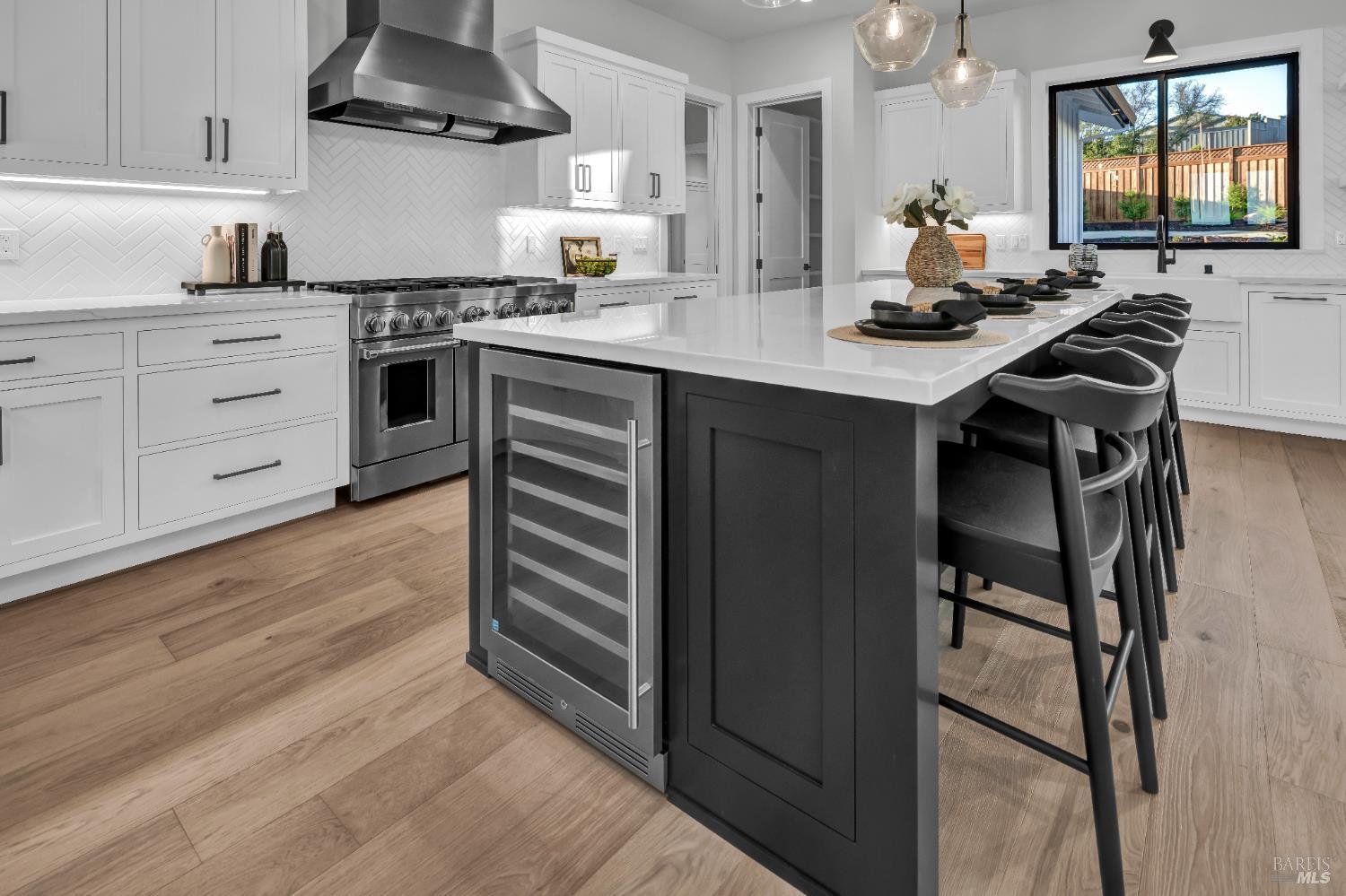 2011 Long Leaf Court Santa Rosa, CA 95403 - Photo 12 of 55 a kitchen with stainless steel appliances a sink stove and cabinets