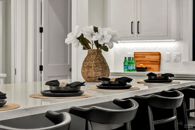a stove top oven sitting inside of a kitchen