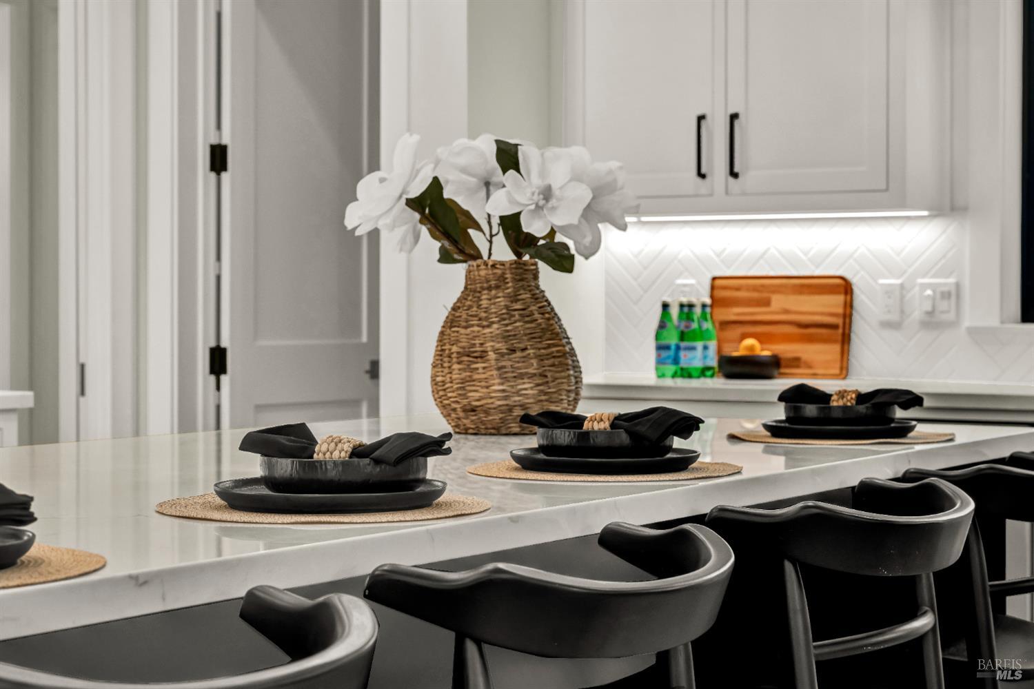 2011 Long Leaf Court Santa Rosa, CA 95403 - Photo 14 of 55 a table room with two chairs and a potted plant