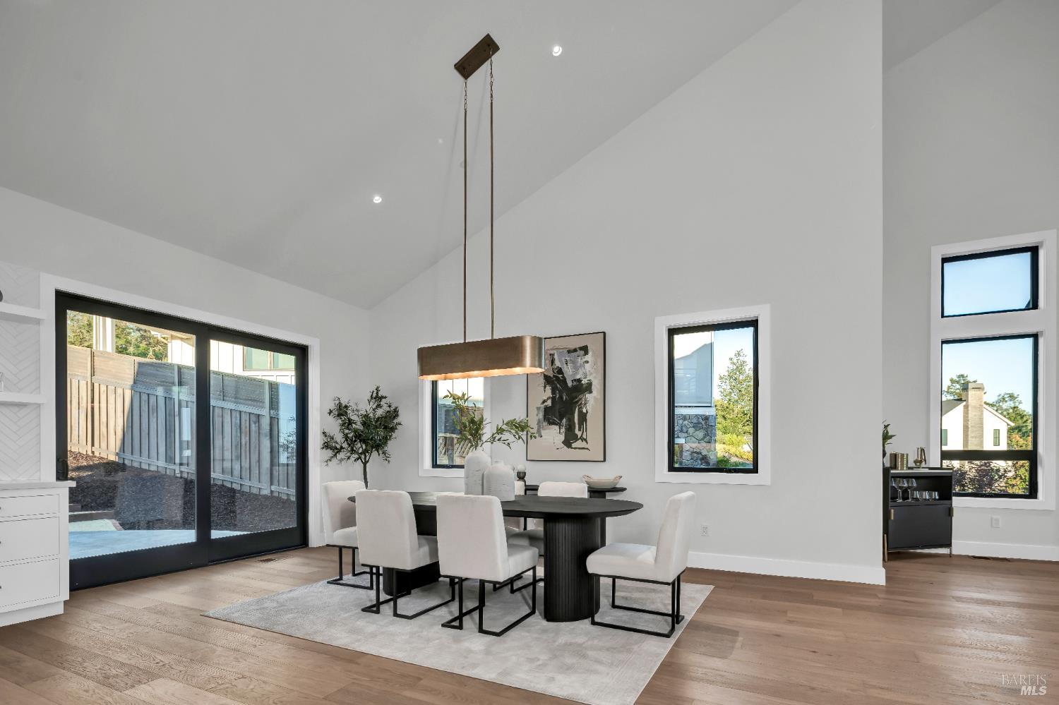 2011 Long Leaf Court Santa Rosa, CA 95403 - Photo 23 of 55 a view of a dining room with furniture window and wooden floor