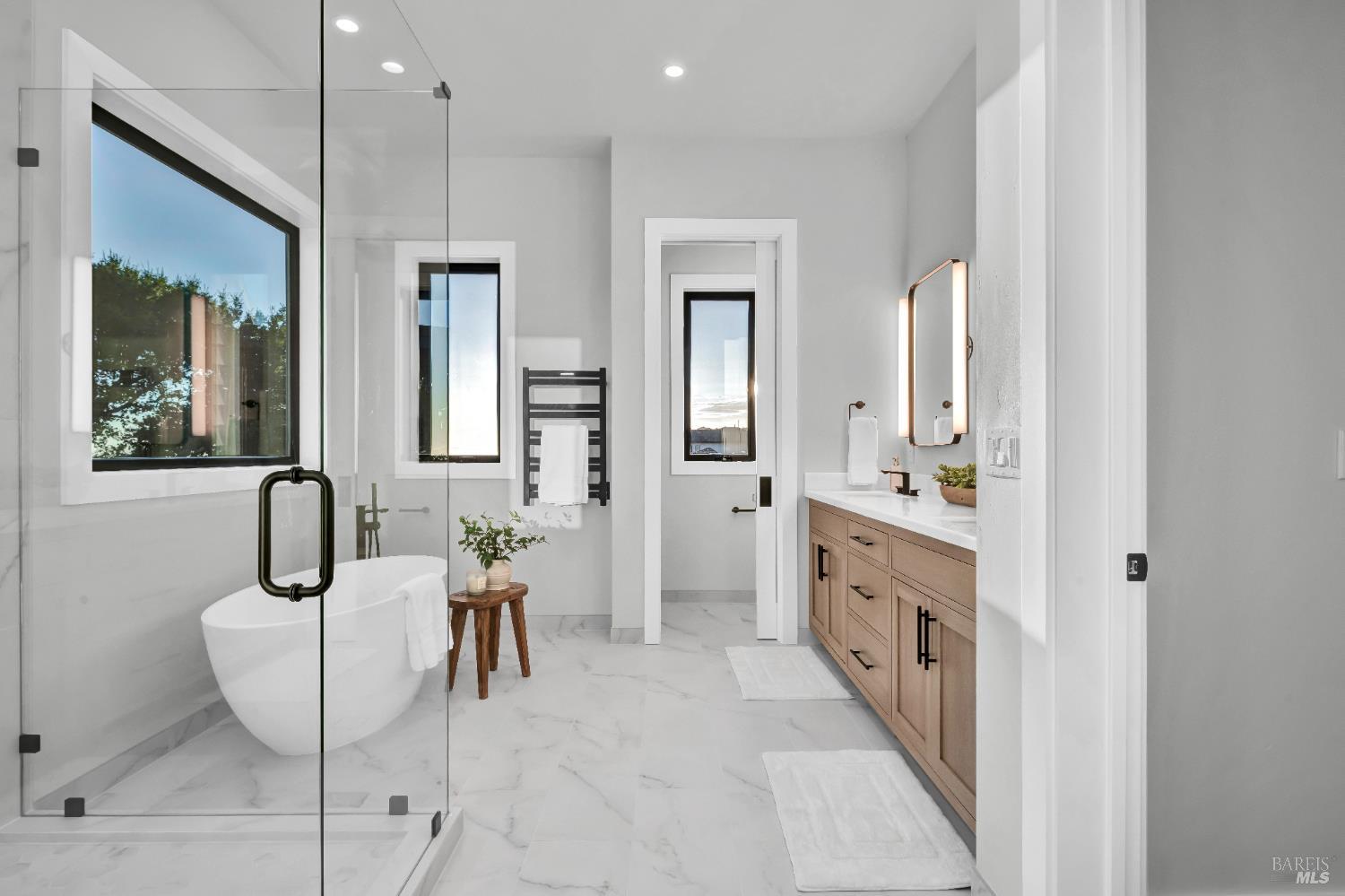 2011 Long Leaf Court Santa Rosa, CA 95403 - Photo 29 of 55 a bathroom with sinks a vanity and a mirror