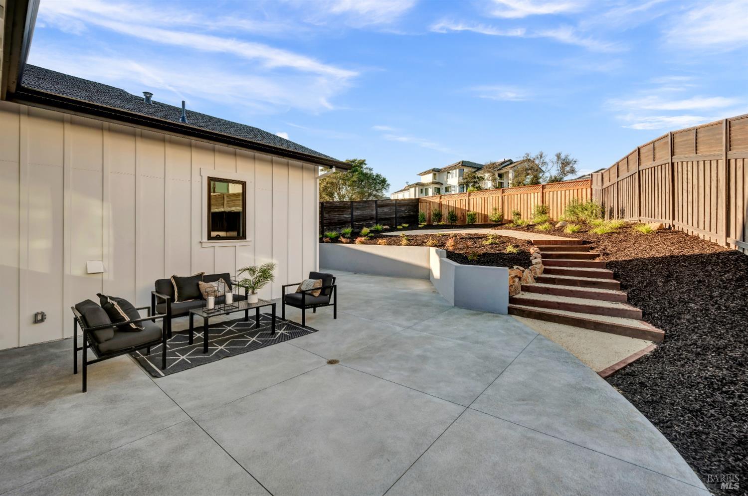 2011 Long Leaf Court Santa Rosa, CA 95403 - Photo 48 of 55 a backyard of a house with table and chairs