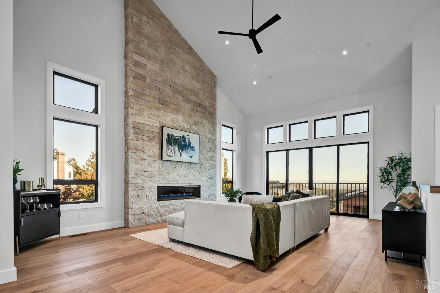 2011 Long Leaf Court Santa Rosa, CA 95403 - Photo 6 of 55 a living room with furniture large windows and a fireplace