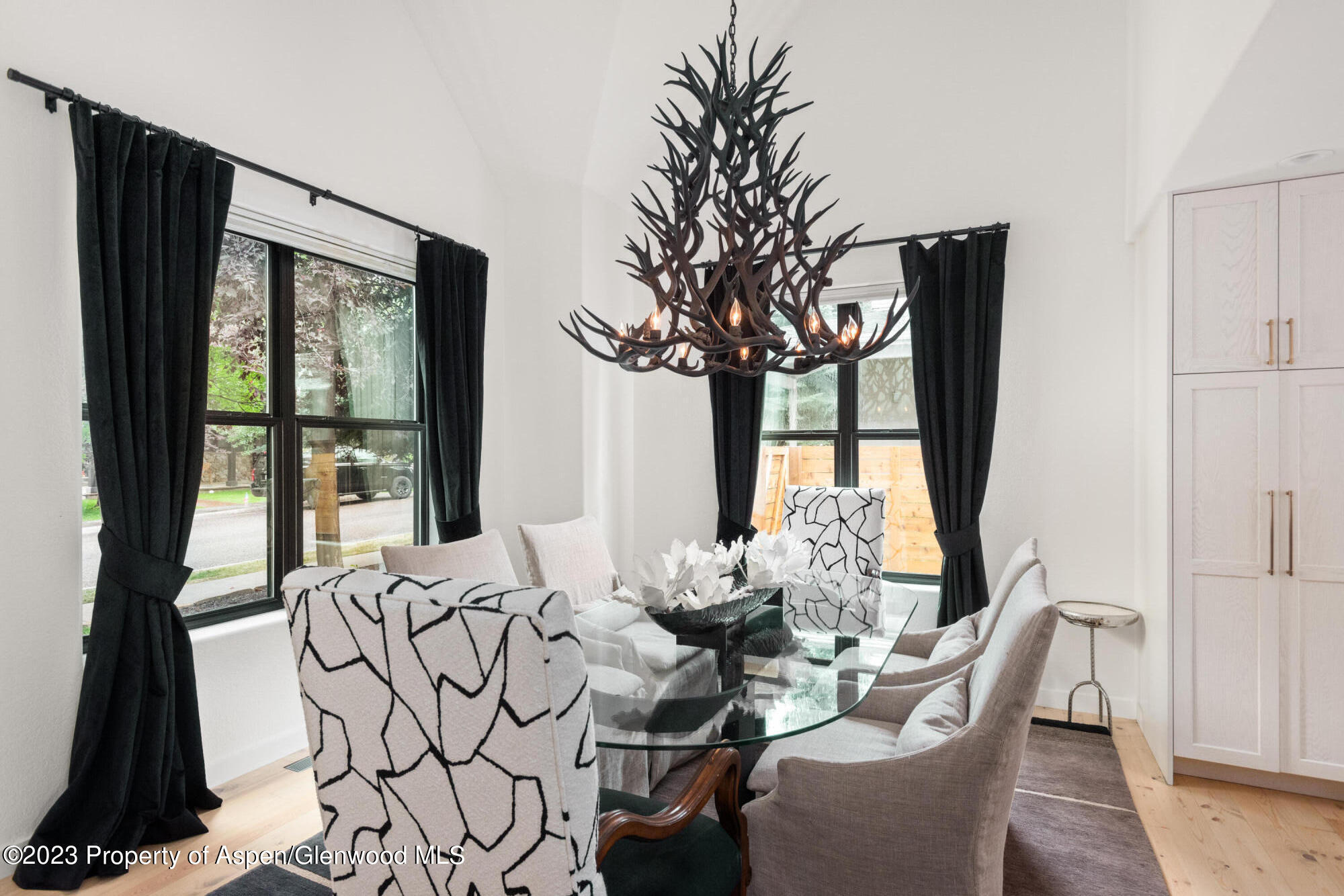 324 Summerset Lane Basalt, CO 81621 - Photo 10 of 40 a view of a dining room with furniture window and outside view