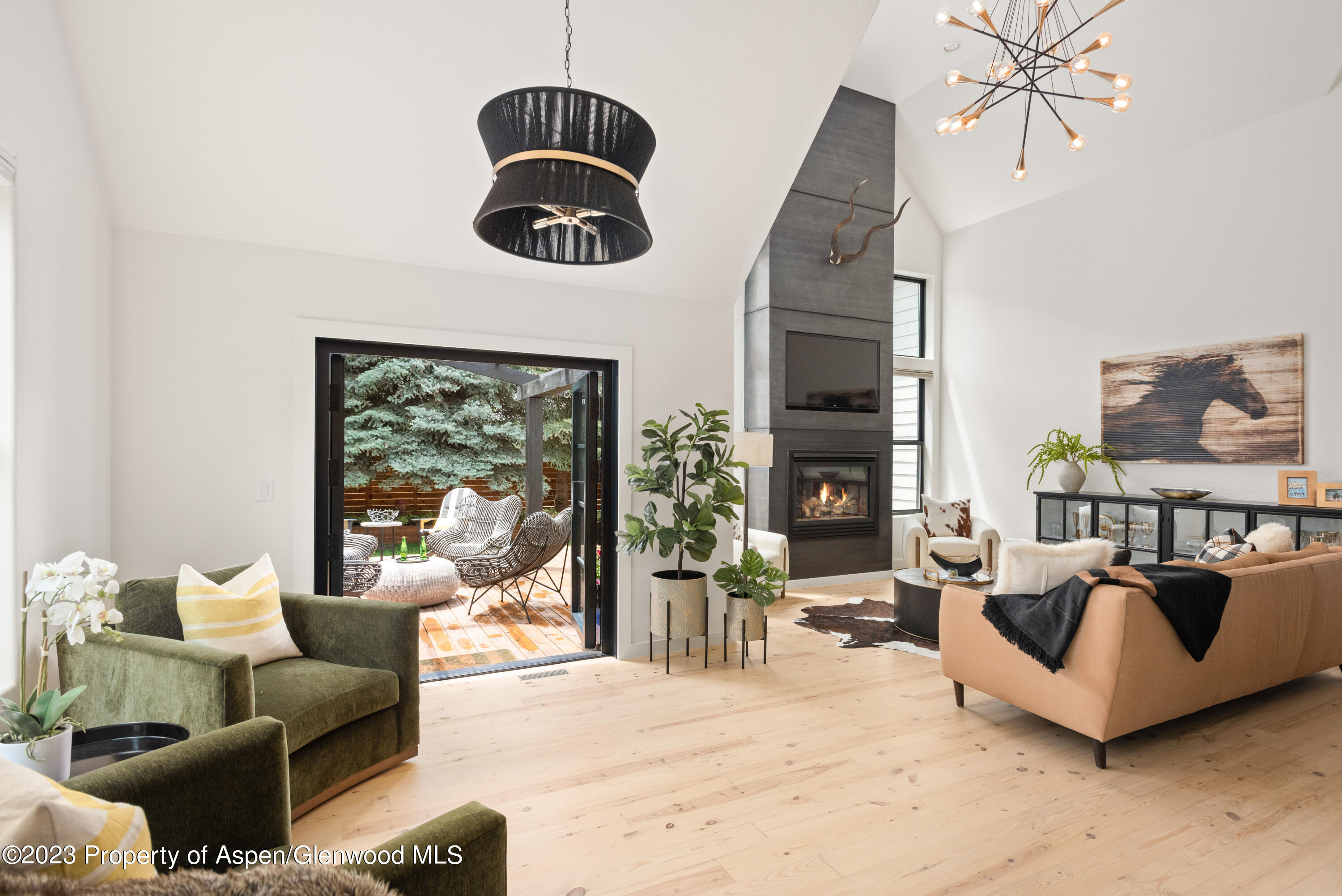 324 Summerset Lane Basalt, CO 81621 - Photo 12 of 40 a living room with furniture and a large window