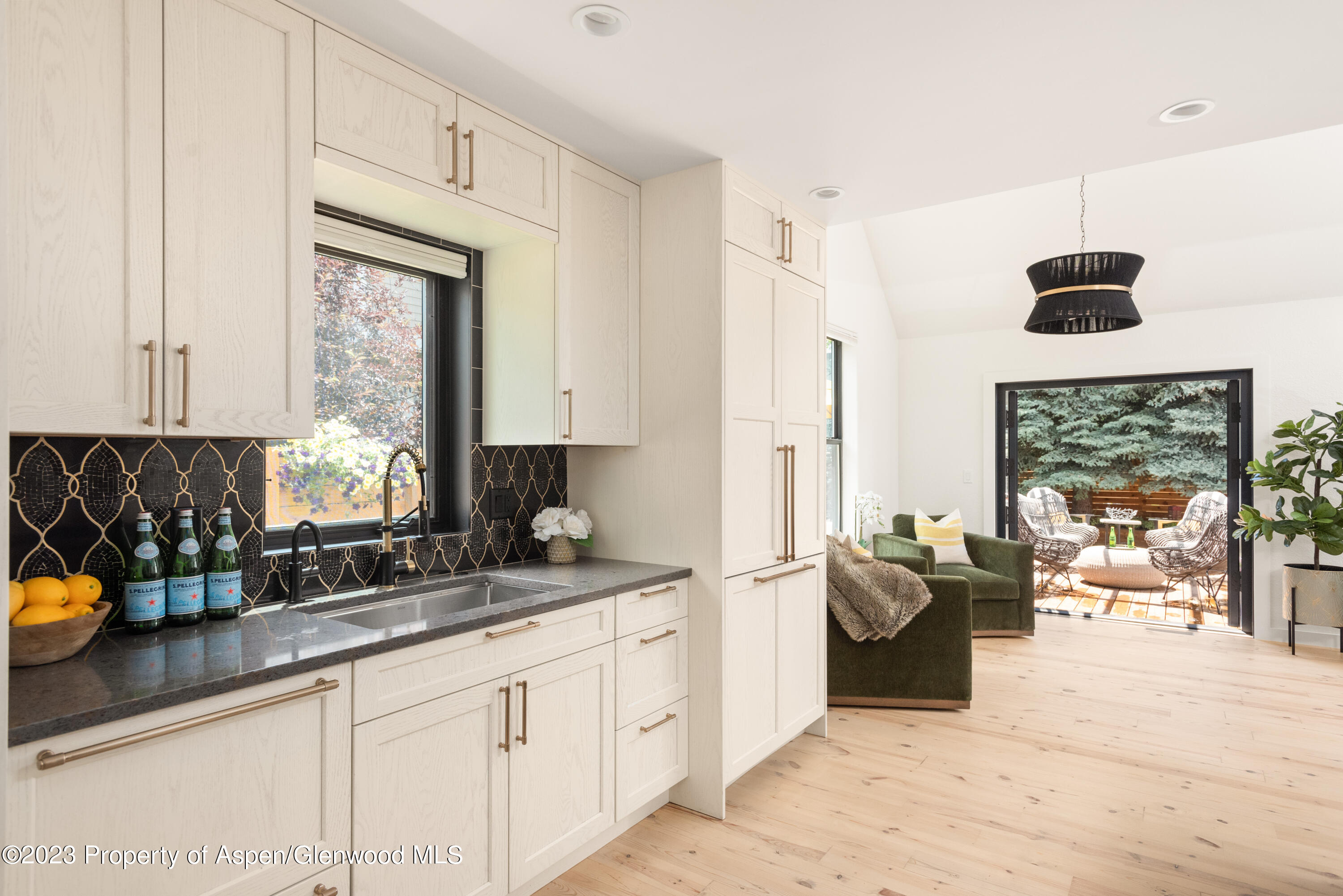 324 Summerset Lane Basalt, CO 81621 - Photo 13 of 40 a kitchen with stainless steel appliances sink stove and cabinets