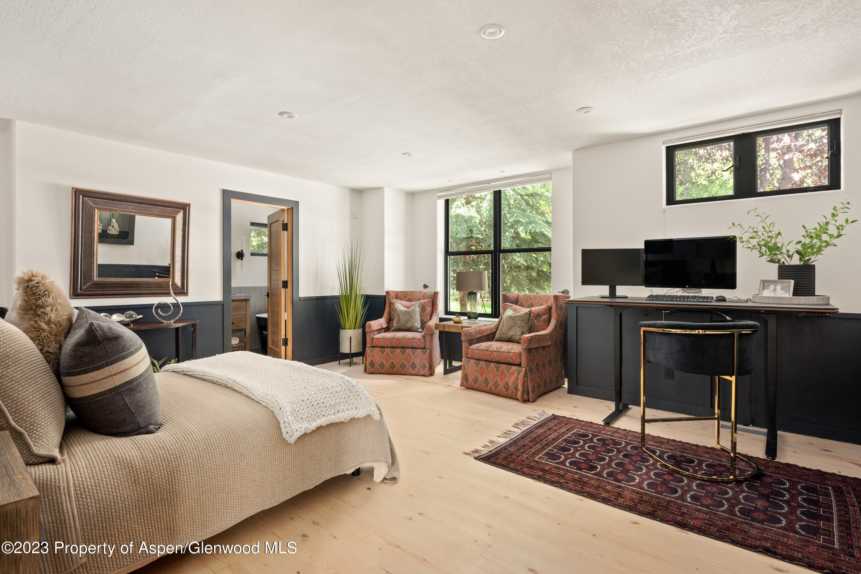 324 Summerset Lane Basalt, CO 81621 - Photo 22 of 40 a bedroom with a bed and a couch