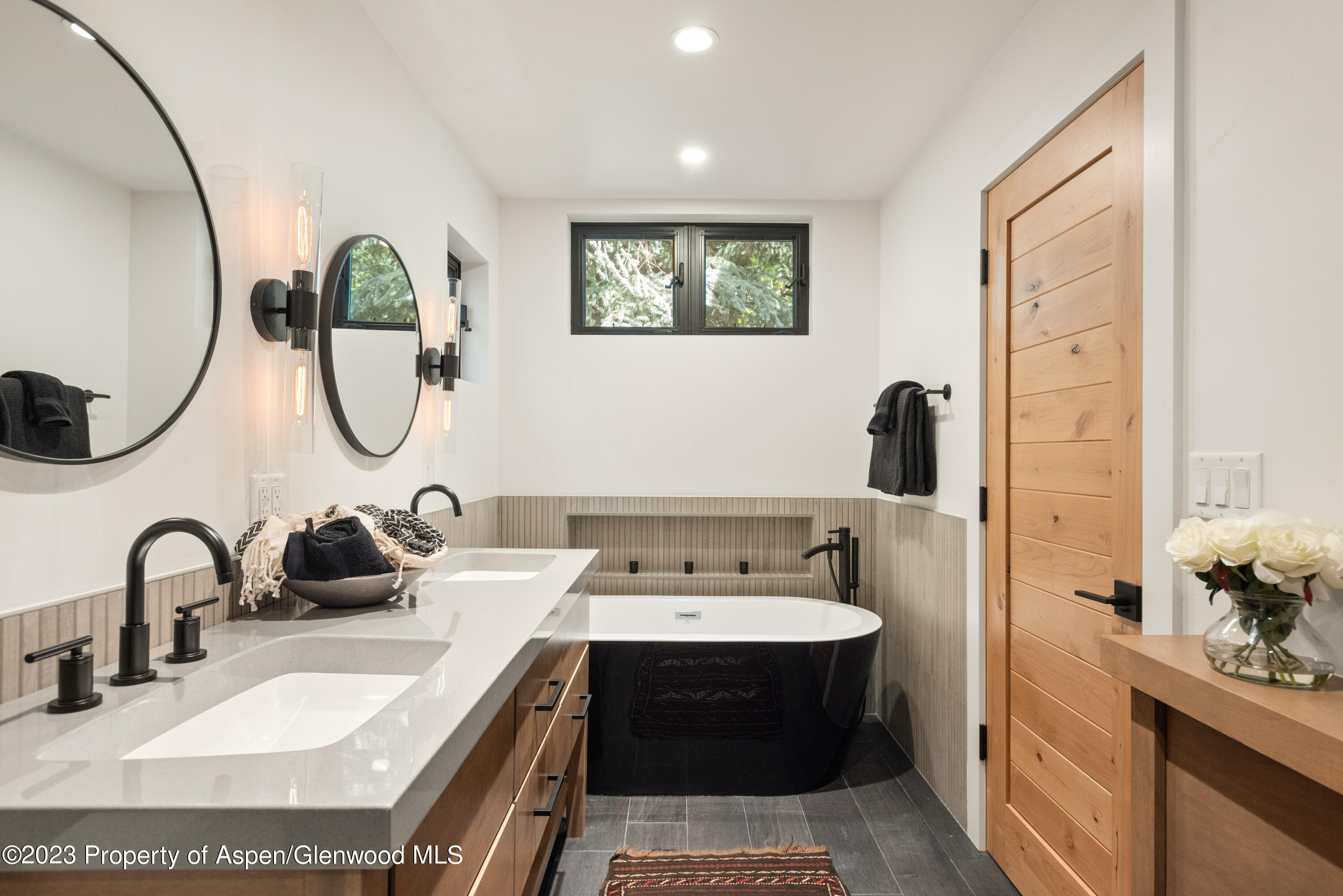 324 Summerset Lane Basalt, CO 81621 - Photo 25 of 40 a bathroom with a sink and a mirror