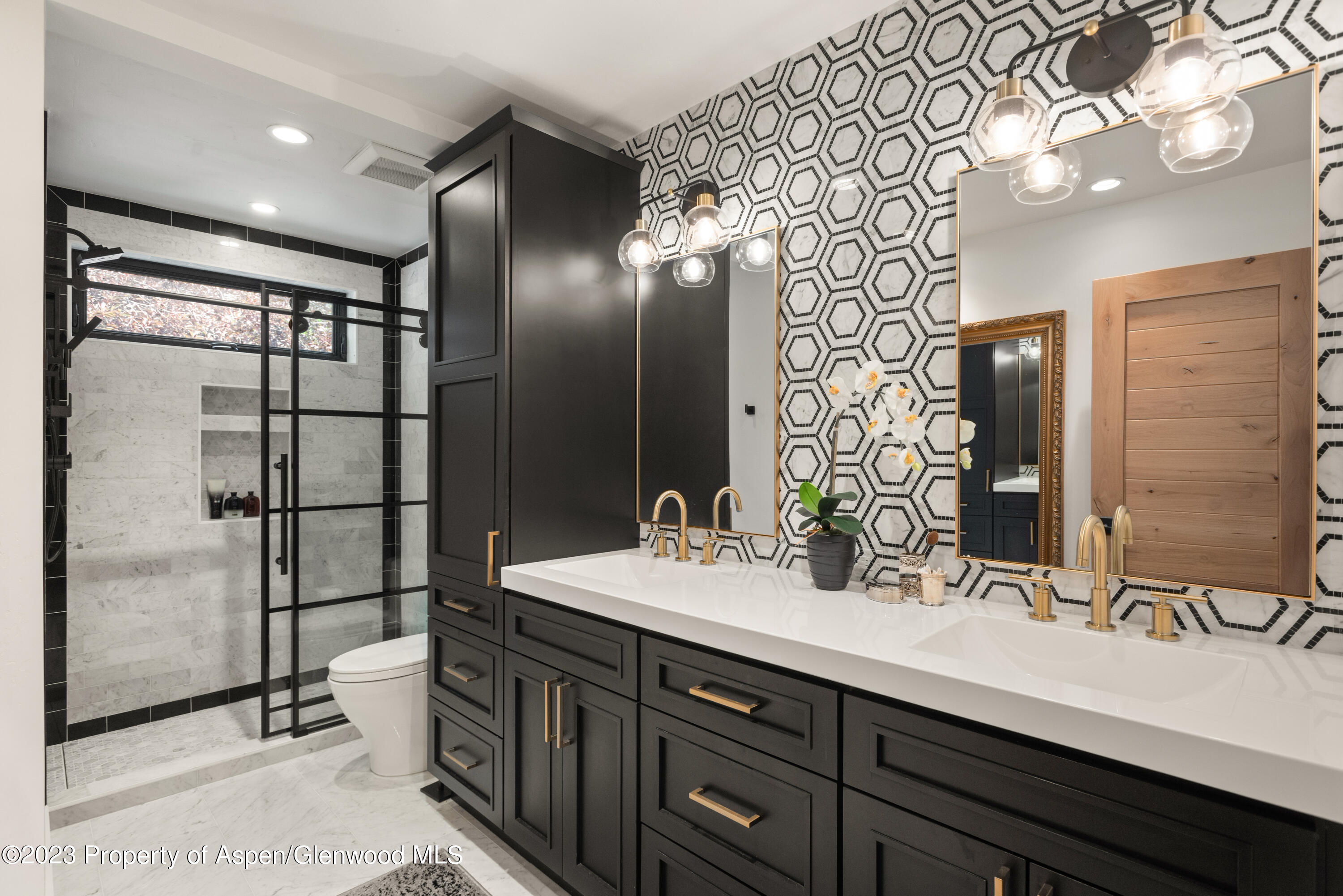 324 Summerset Lane Basalt, CO 81621 - Photo 29 of 40 a bathroom with a double vanity sink mirror and double