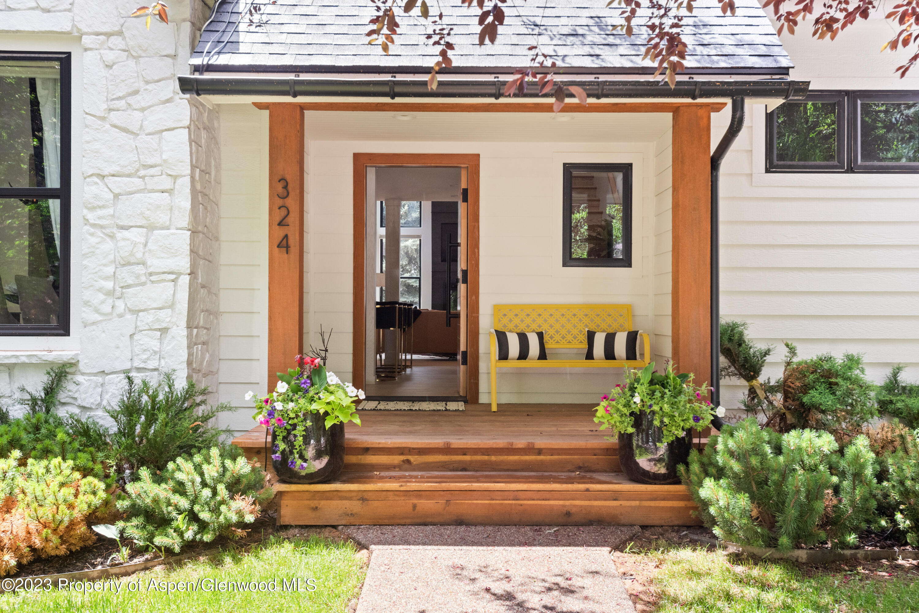 324 Summerset Lane Basalt, CO 81621 - Photo 3 of 40 a front view of a house with potted plants