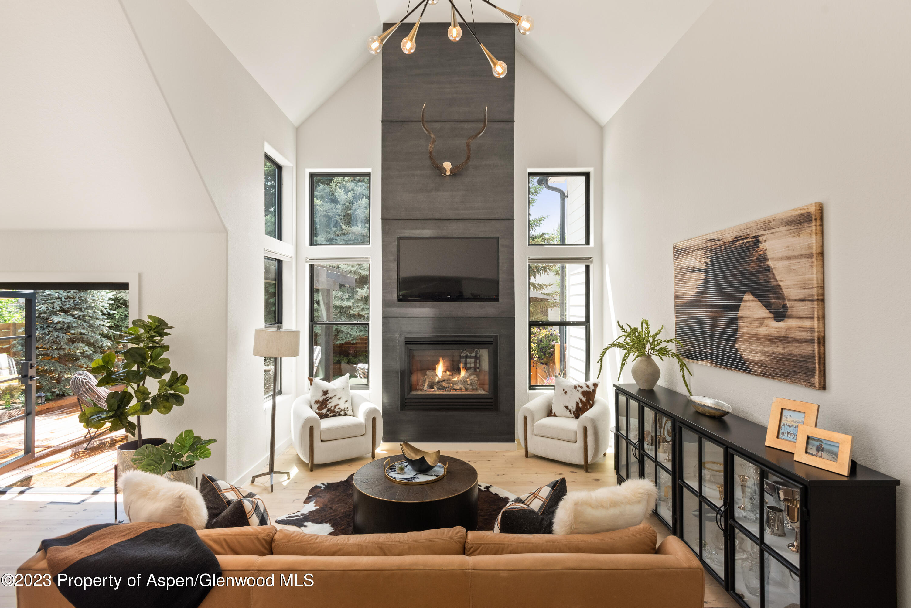 324 Summerset Lane Basalt, CO 81621 - Photo 4 of 40 a living room with furniture and a fireplace