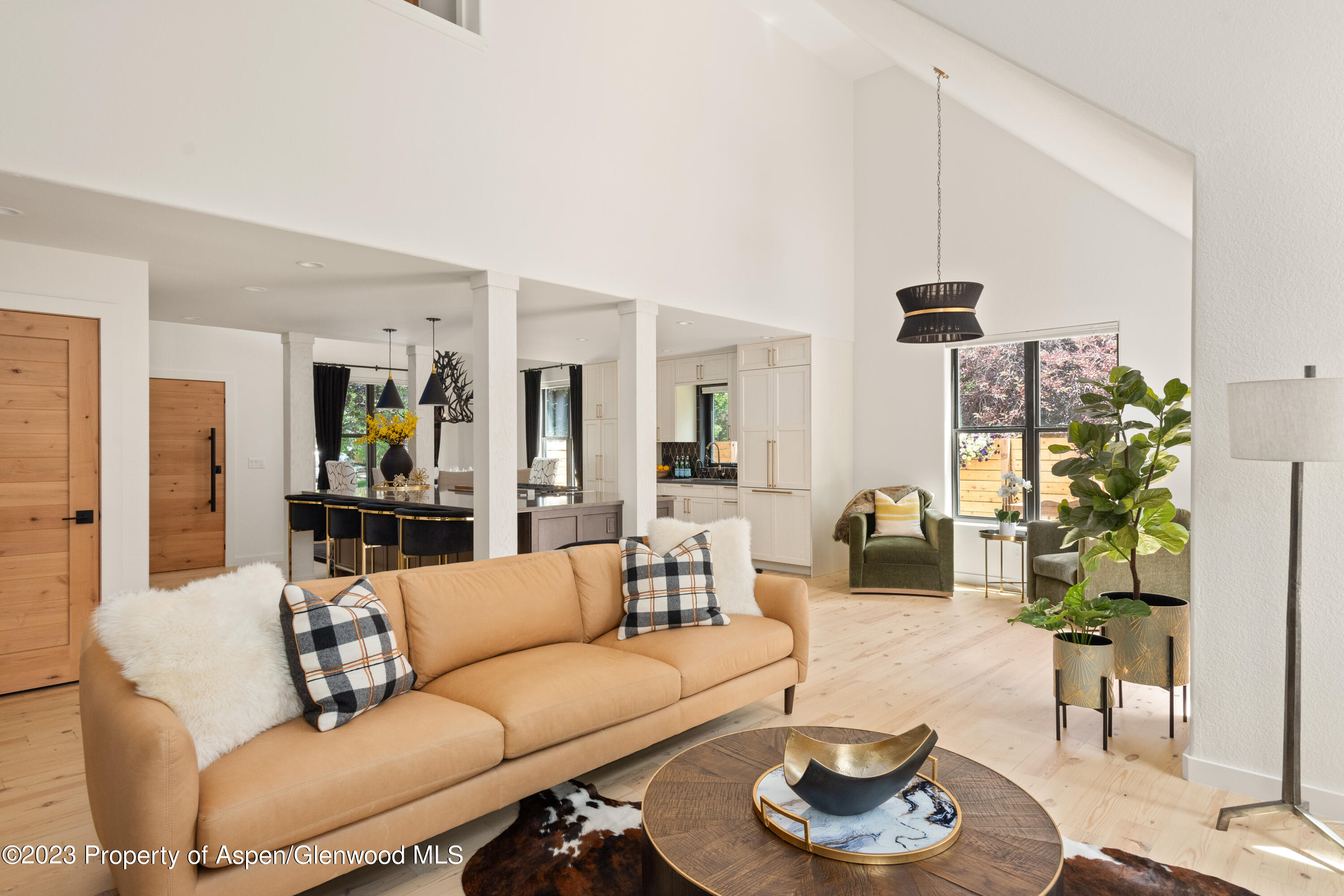 324 Summerset Lane Basalt, CO 81621 - Photo 7 of 40 a living room with furniture and a wooden floor