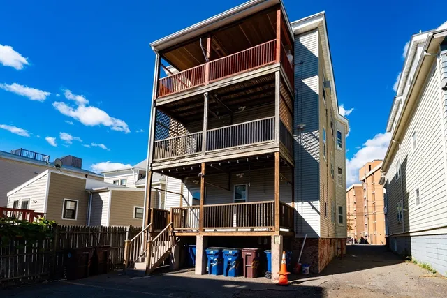 a view of building with glass windows