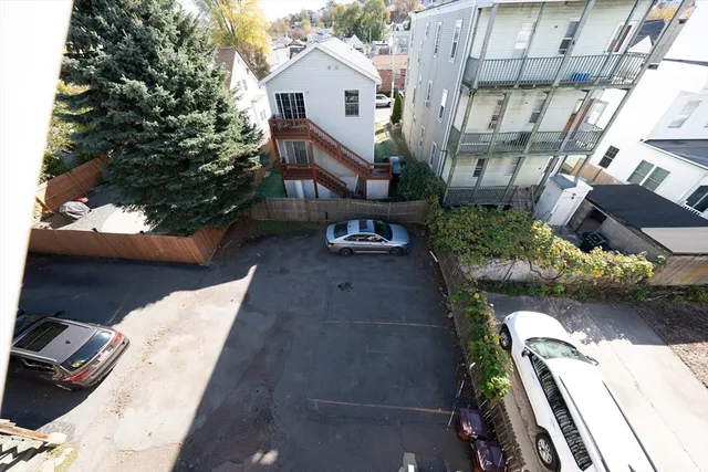 a aerial view of a house with a yard