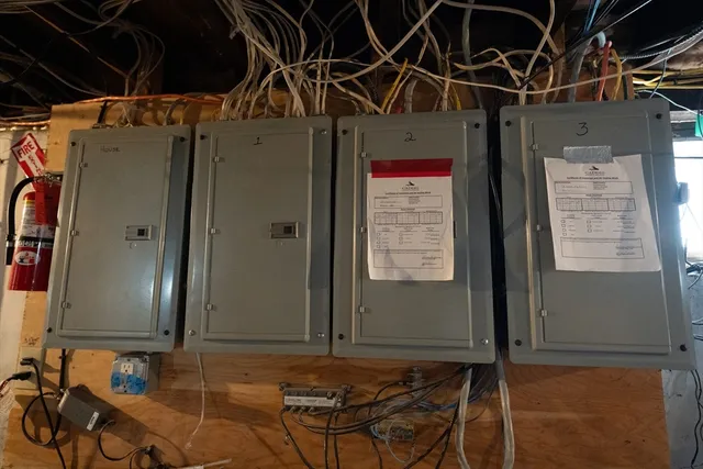 a bathroom with a mirror and shower
