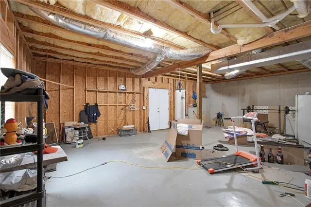 a view of roof deck with wooden floor and fence