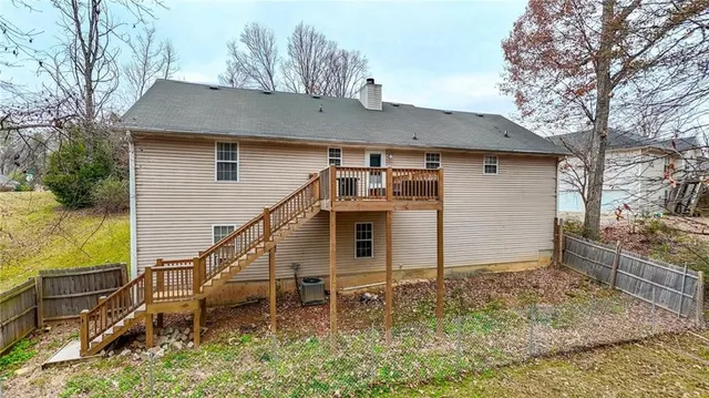 an aerial view of a house with swimming pool