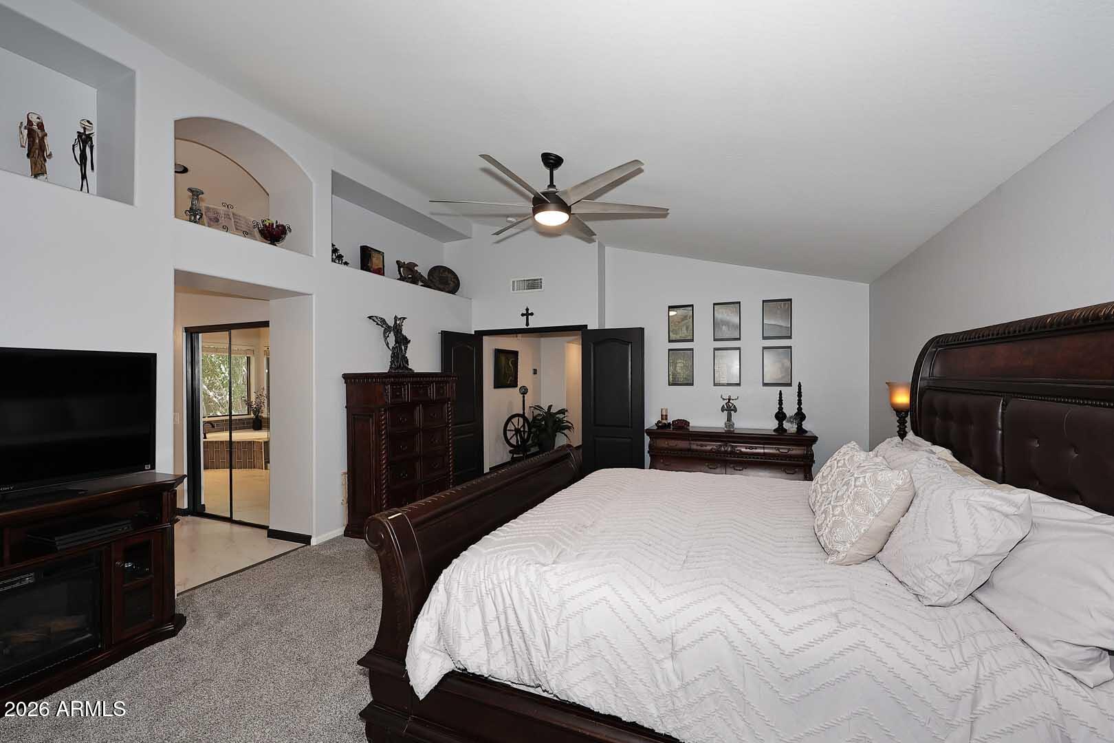 7272 West Crystal Road Glendale, AZ 85308 - Photo 20 of 52 a bedroom with a bed and a television