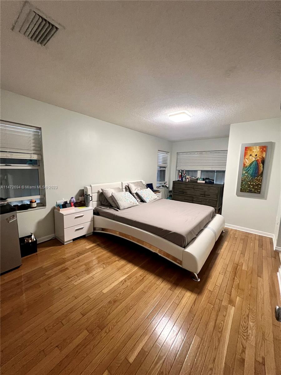 West End Miami, FL 33185 - Photo 13 of 30 a bedroom with a bed and a view of bedroom