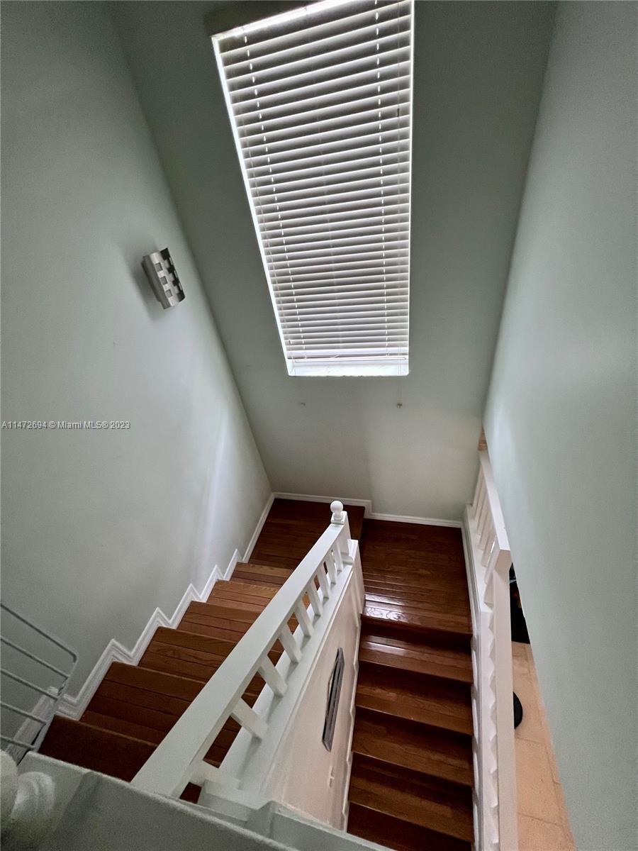 West End Miami, FL 33185 - Photo 19 of 30 a view of an empty room with wooden floor