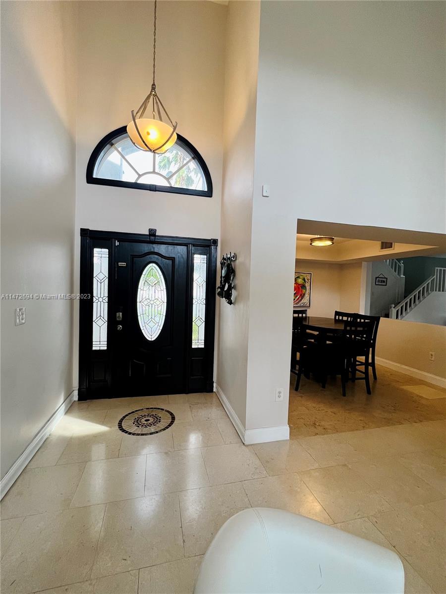 West End Miami, FL 33185 - Photo 2 of 30 a living room with furniture and a wooden floor